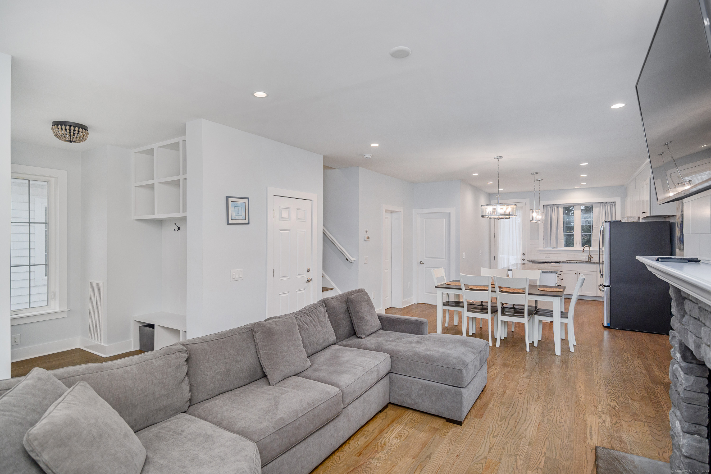 1039 Reef Road Fairfield, CT 06824 - Photo 5 of 26 a living room with furniture and a wooden floor