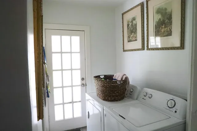 a utility room with dryer and washer