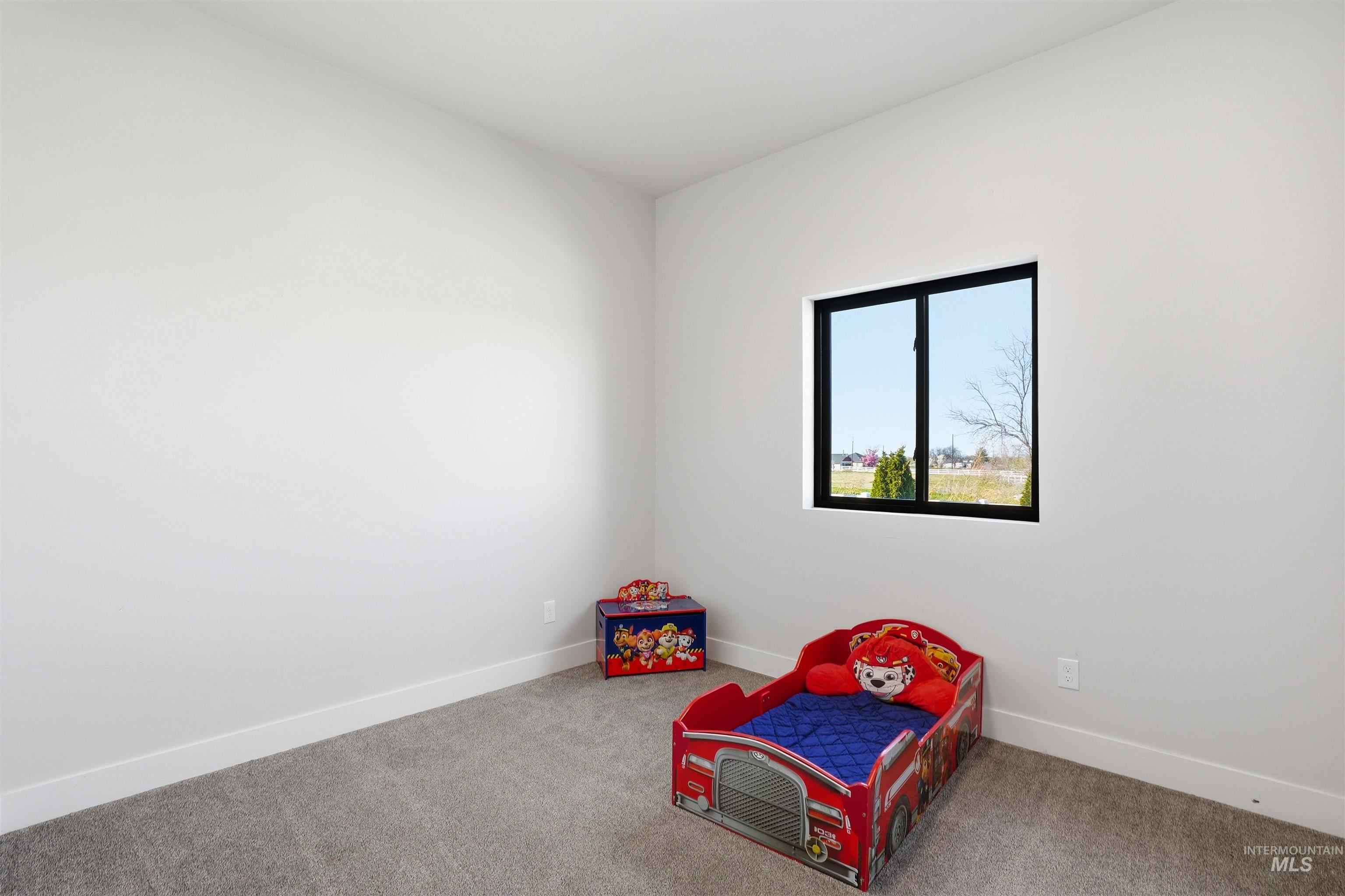 320 West Homedale Road Caldwell, ID 83607 - Photo 19 of 48 Unfurnished room with carpet