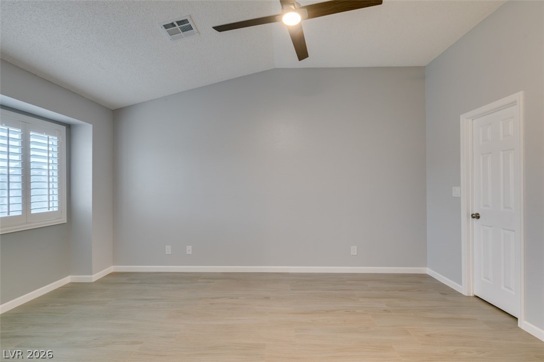 540 Sutters Mill Road Henderson, NV 89014 - Photo 41 of 46 Bright and airy bedroom with vaulted ceilings and ample natural light.