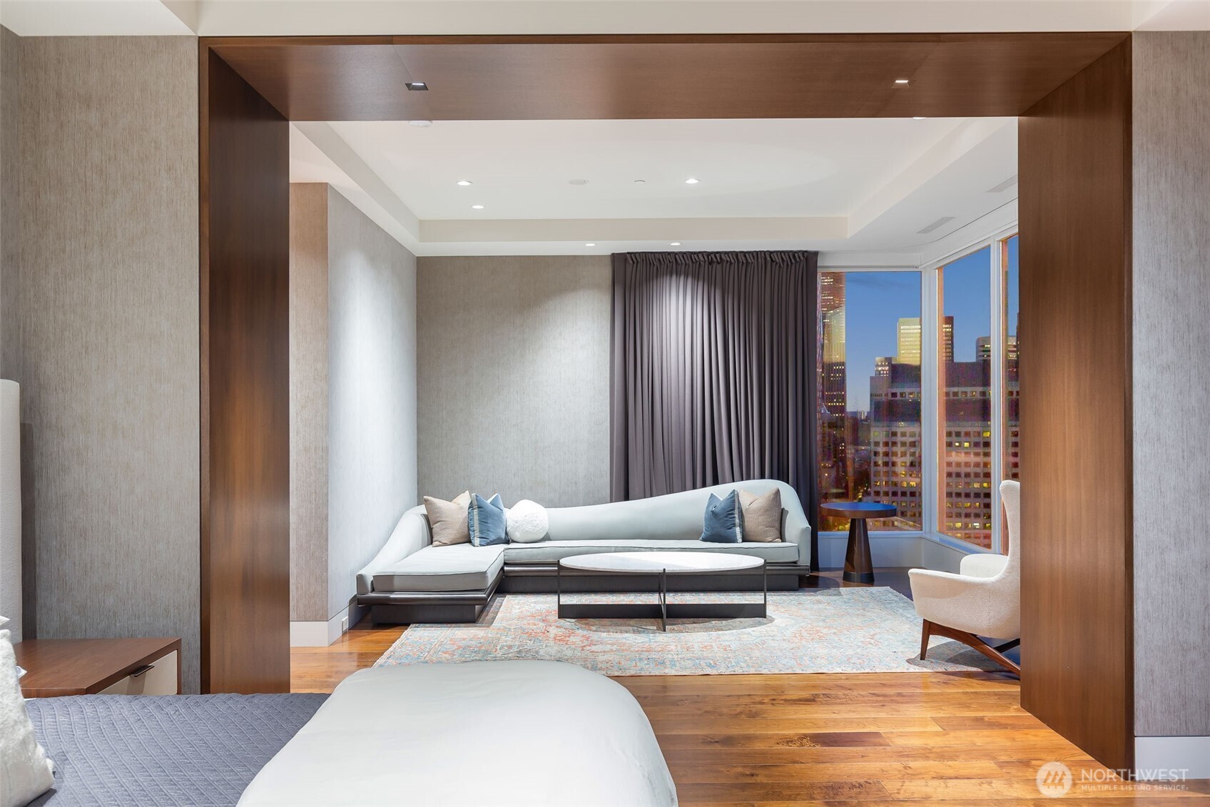 1920 4th Avenue, Unit PH101 Seattle, WA 98101 - Photo 11 of 40 a bedroom with furniture and window