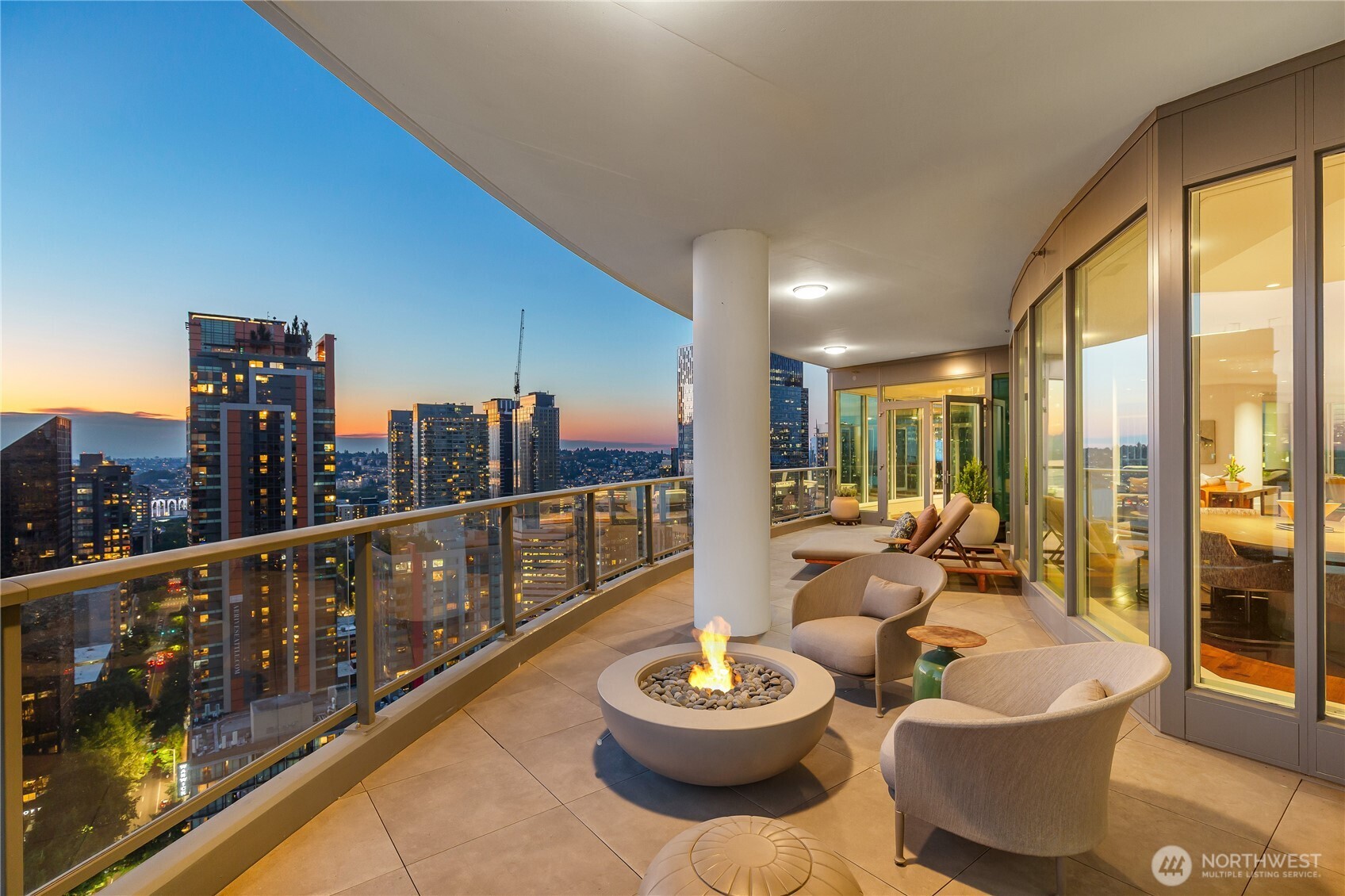 1920 4th Avenue, Unit PH101 Seattle, WA 98101 - Photo 16 of 40 a living room with furniture and a large window