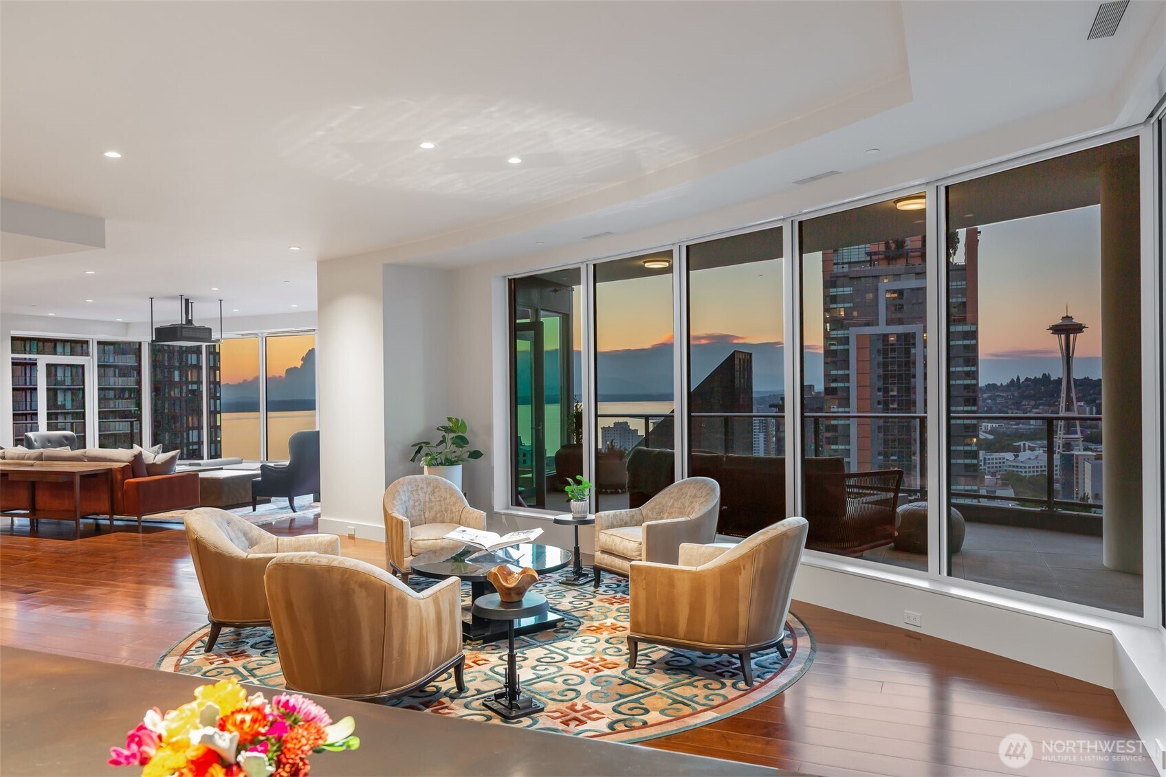 1920 4th Avenue, Unit PH101 Seattle, WA 98101 - Photo 19 of 40 a living room with patio furniture and a potted plant