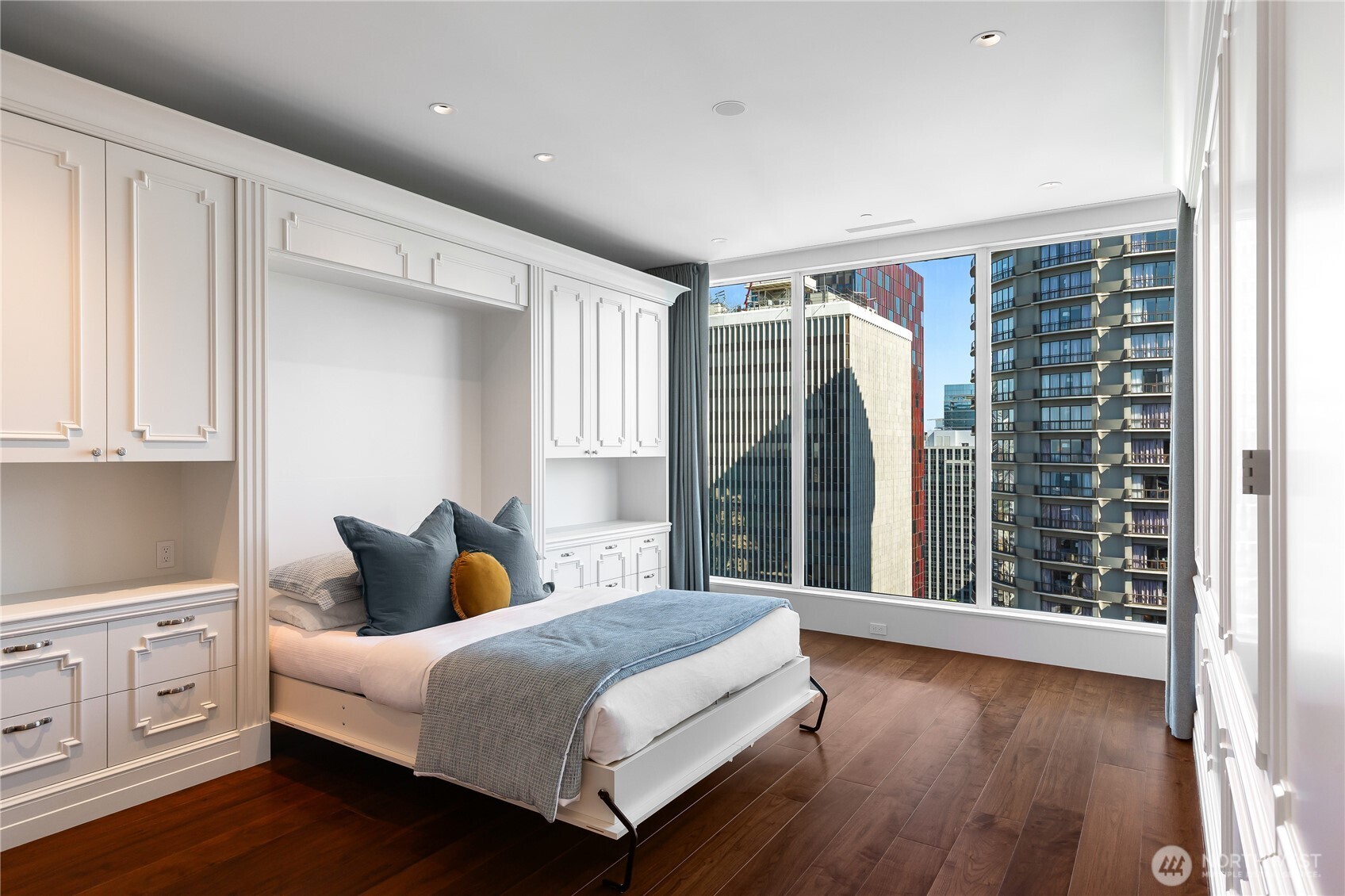 1920 4th Avenue, Unit PH101 Seattle, WA 98101 - Photo 27 of 40 a bedroom with a large bed and a window