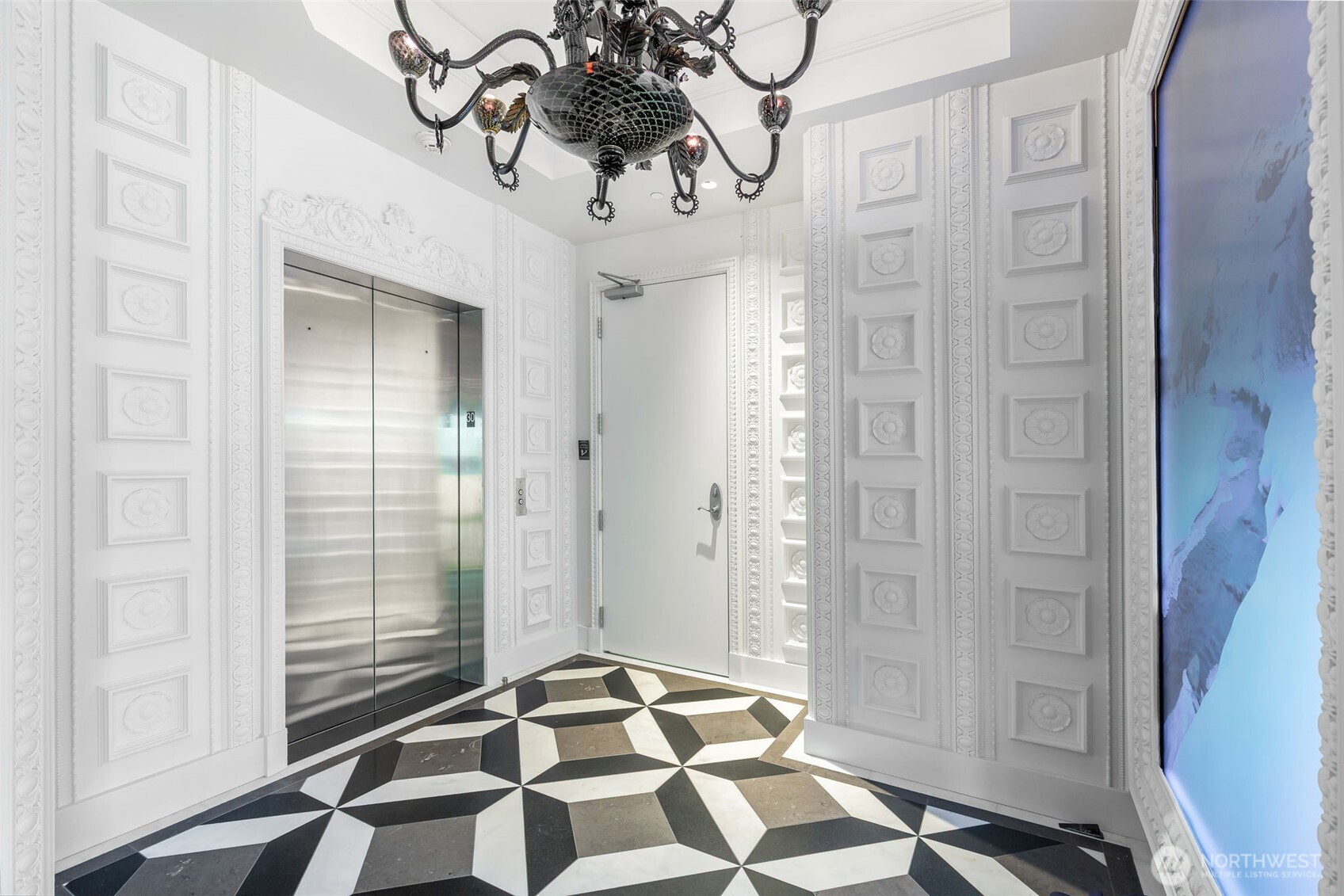 1920 4th Avenue, Unit PH101 Seattle, WA 98101 - Photo 29 of 40 a view of a bathroom with a shower and a sink