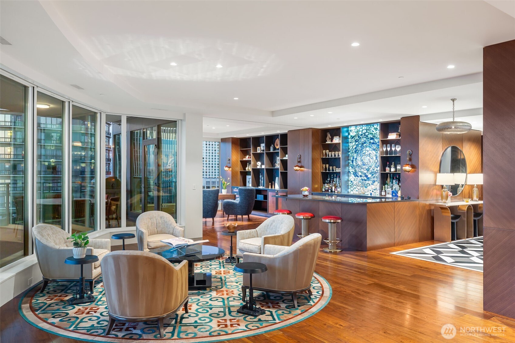 1920 4th Avenue, Unit PH101 Seattle, WA 98101 - Photo 3 of 40 a living room with fireplace furniture and a large window