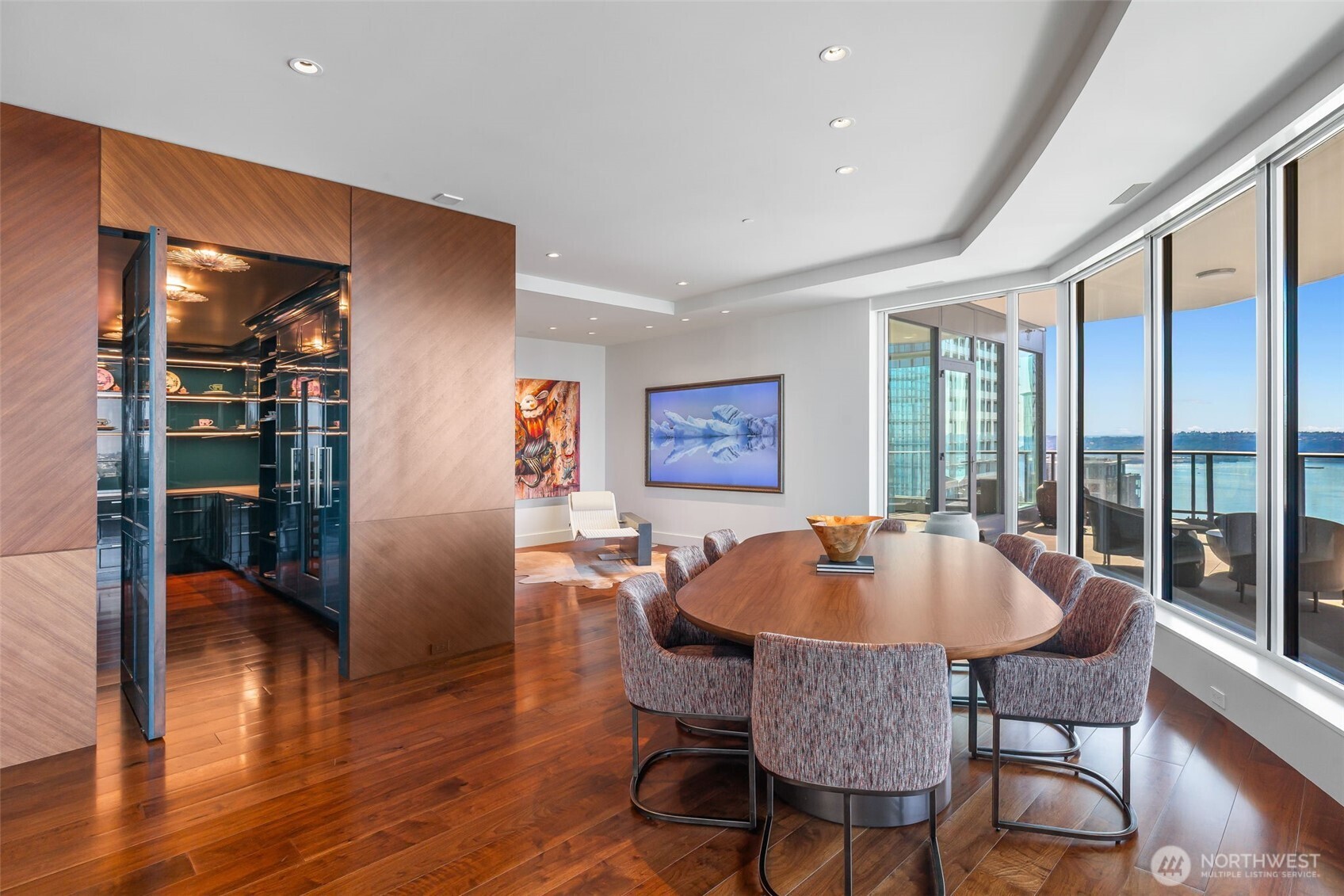 1920 4th Avenue, Unit PH101 Seattle, WA 98101 - Photo 31 of 40 a dining room with furniture window and wooden floor