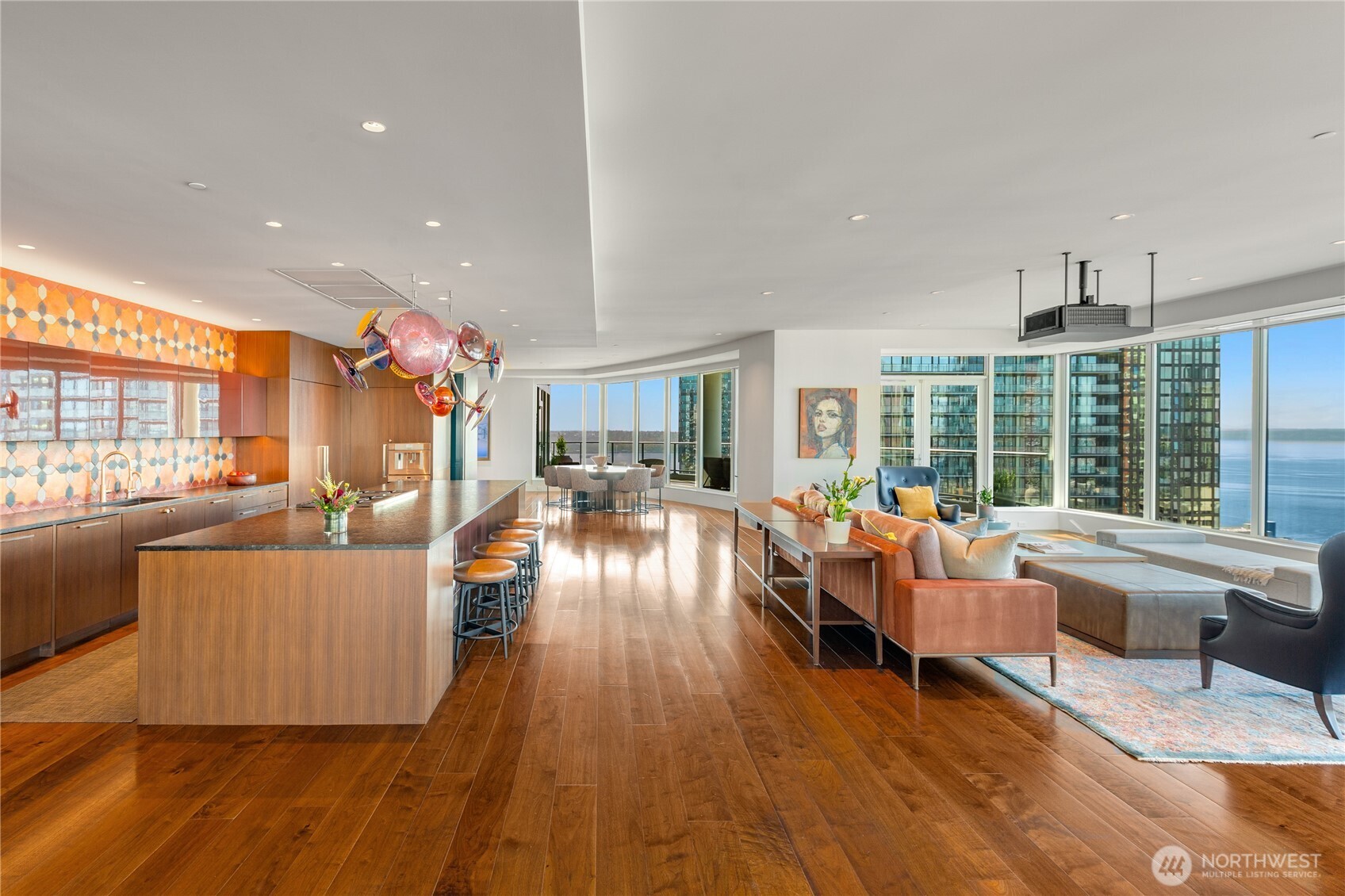 1920 4th Avenue, Unit PH101 Seattle, WA 98101 - Photo 34 of 40 a living room with furniture and a large window