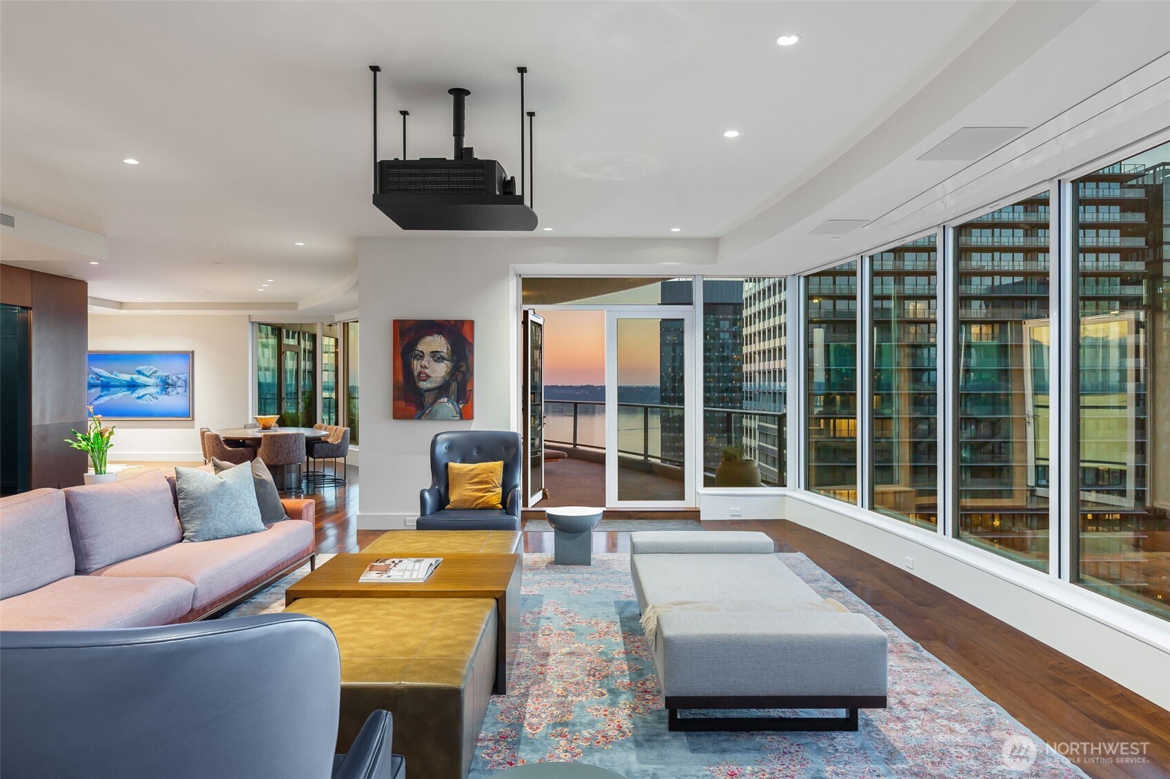 1920 4th Avenue, Unit PH101 Seattle, WA 98101 - Photo 6 of 40 a living room with furniture and a large window