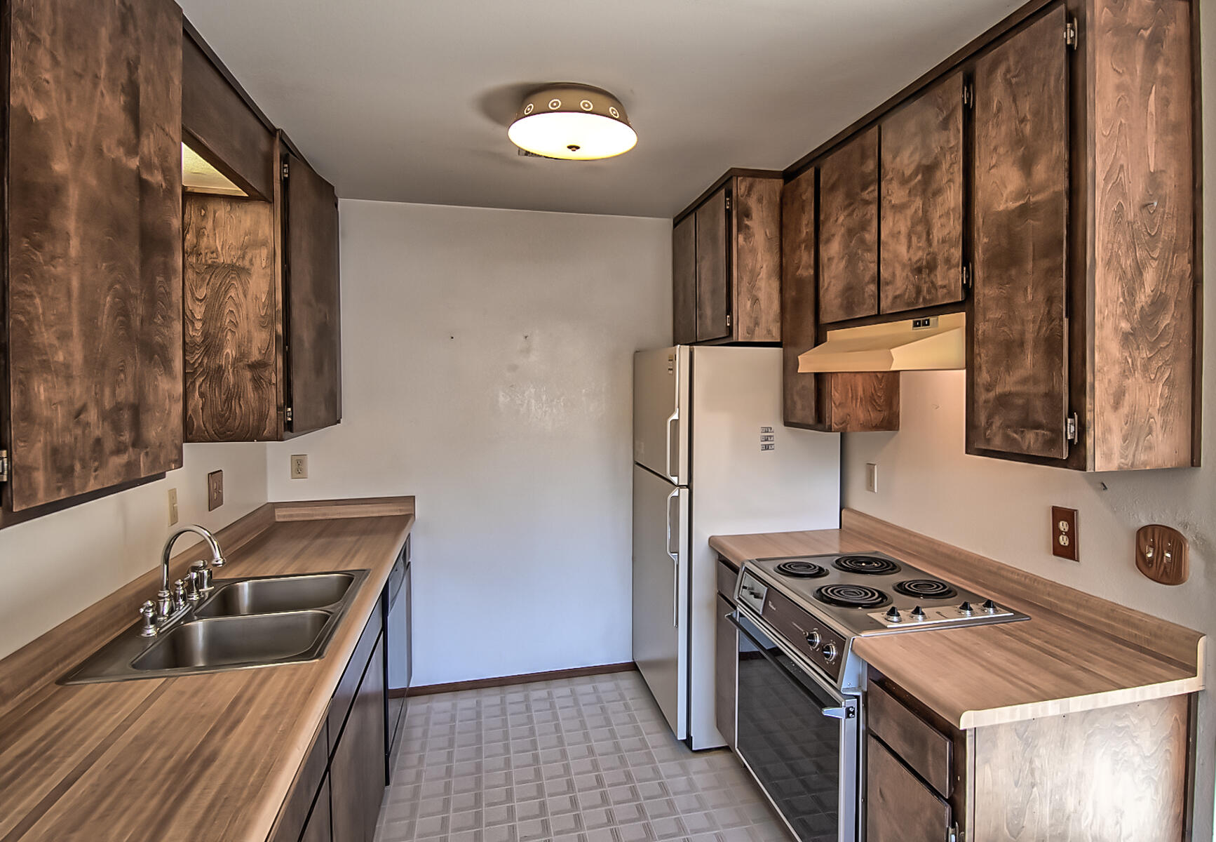 4597 Cedars Road Redding, CA 96001 - Photo 4 of 18 a kitchen that has a sink and a stove