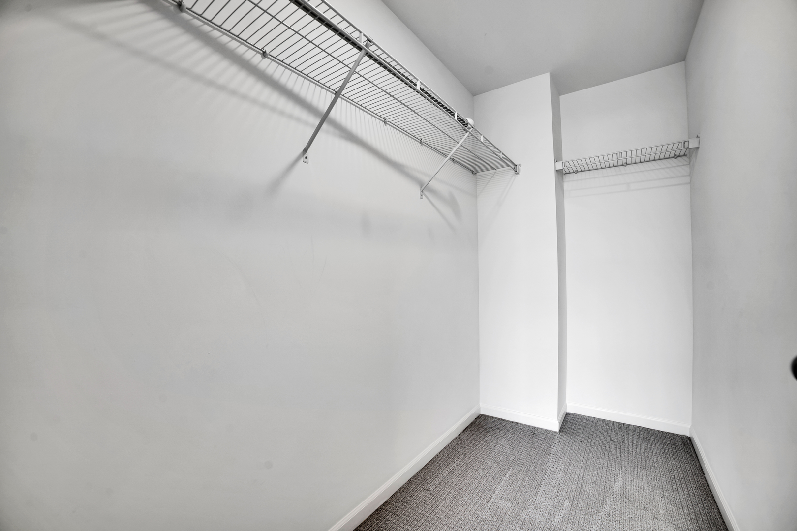 1292 Quadrant Lane Schaumburg, IL 60173 - Photo 16 of 39 a view of a room with racks on the wall