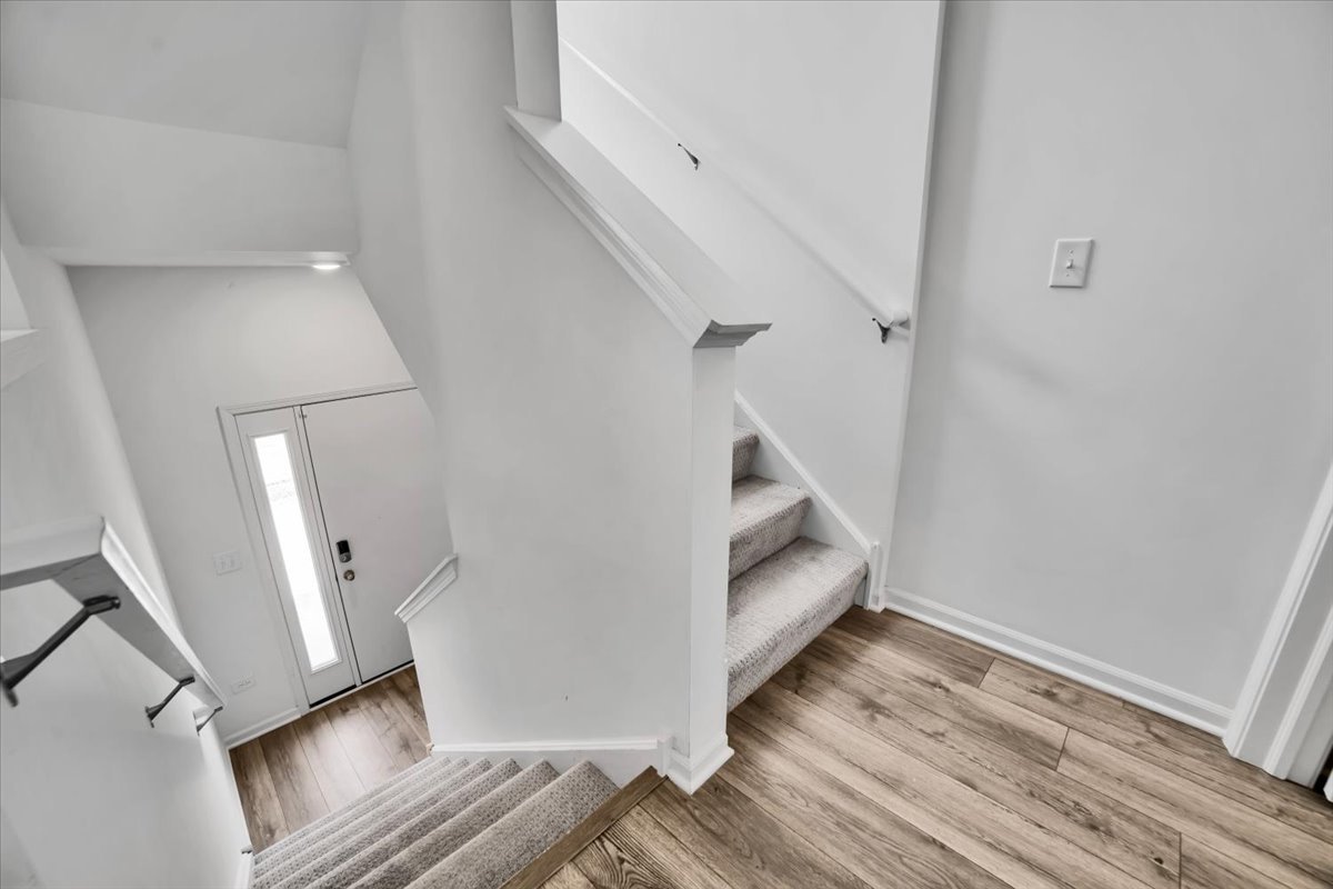 1292 Quadrant Lane Schaumburg, IL 60173 - Photo 27 of 39 a view of an entryway with wooden floor