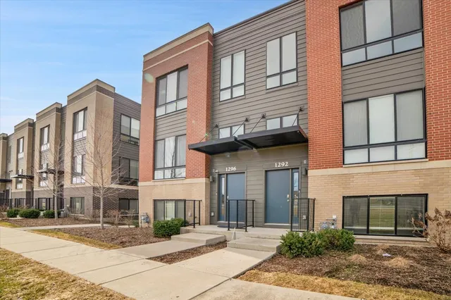 a front view of a multi story residential apartment building