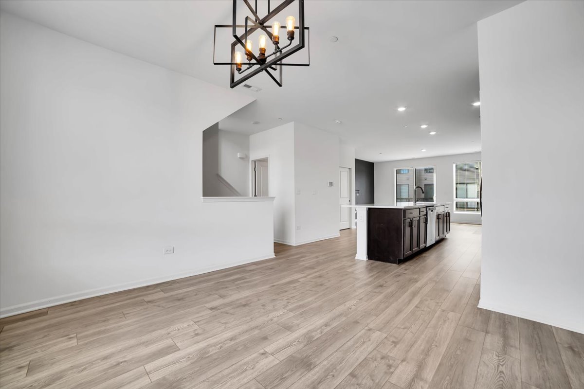1292 Quadrant Lane Schaumburg, IL 60173 - Photo 8 of 39 a view of empty room with wooden floor