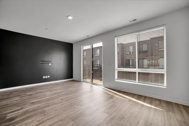 a view of kitchen with wooden floor