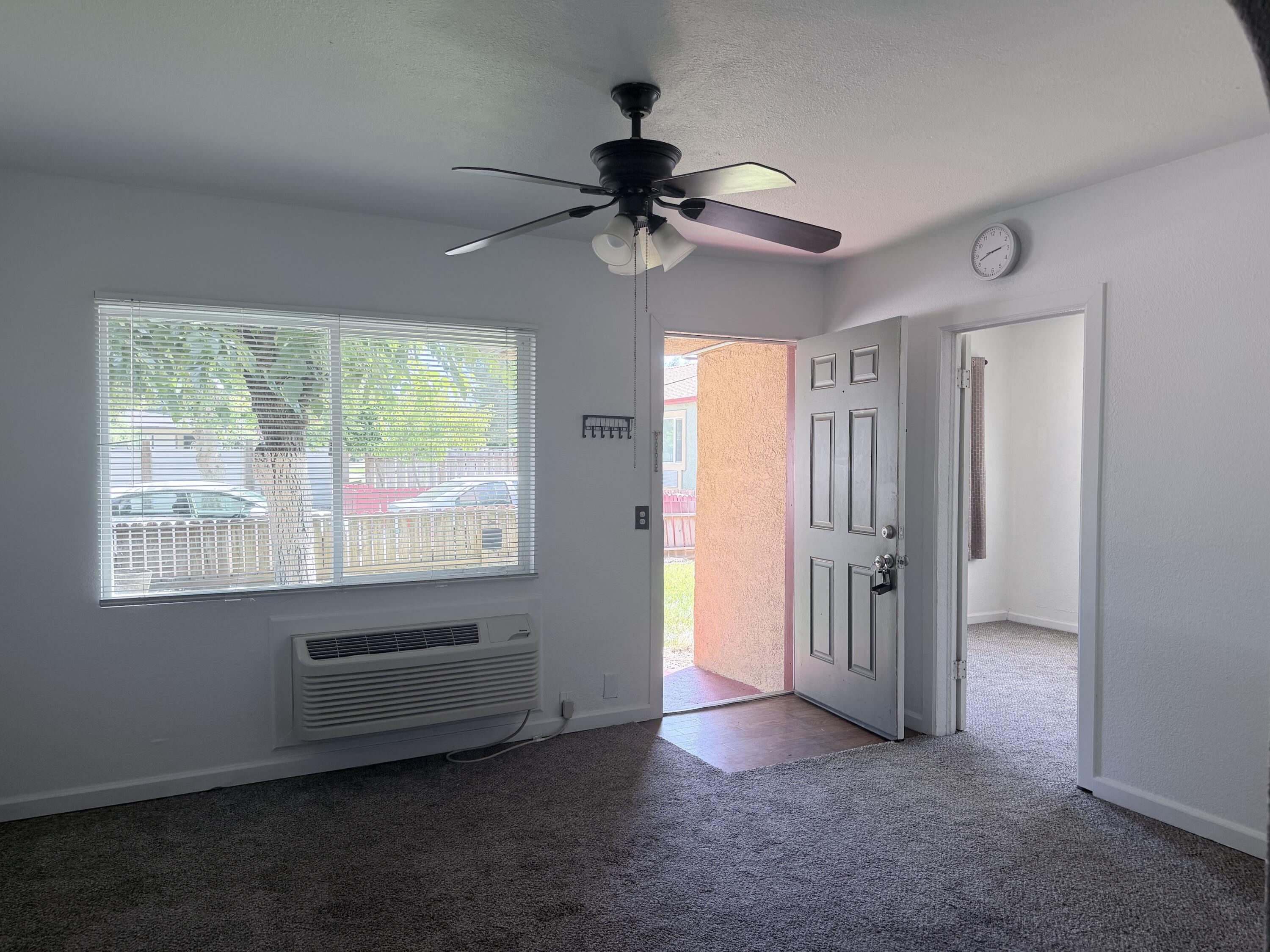 2230 El Reno Lane Redding, CA 96001 - Photo 25 of 27 wooden floor in an empty room with a window