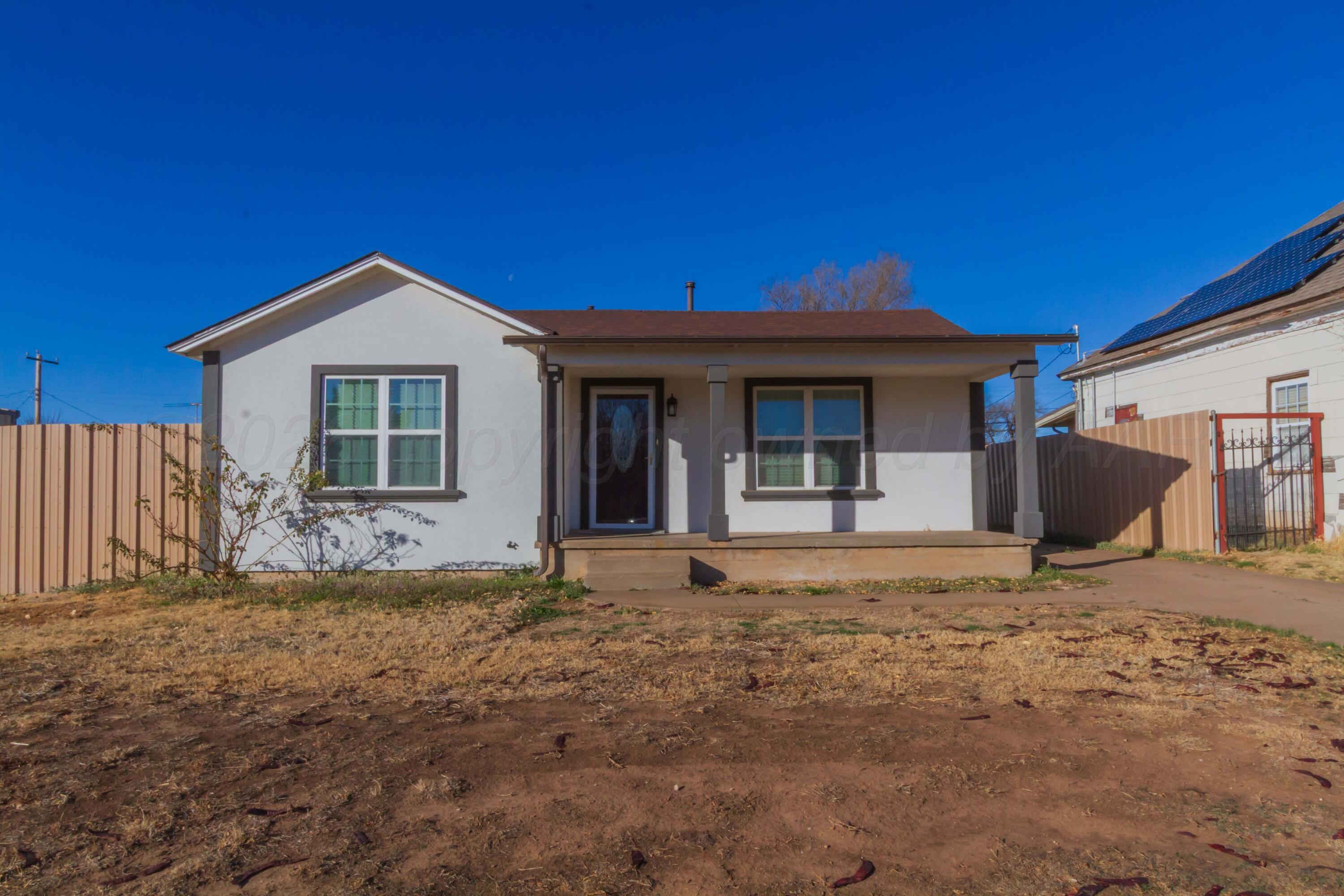 706 Pittsburg Street Amarillo, TX 79104 - Photo 1 of 22 a view of a house with backyard and porch