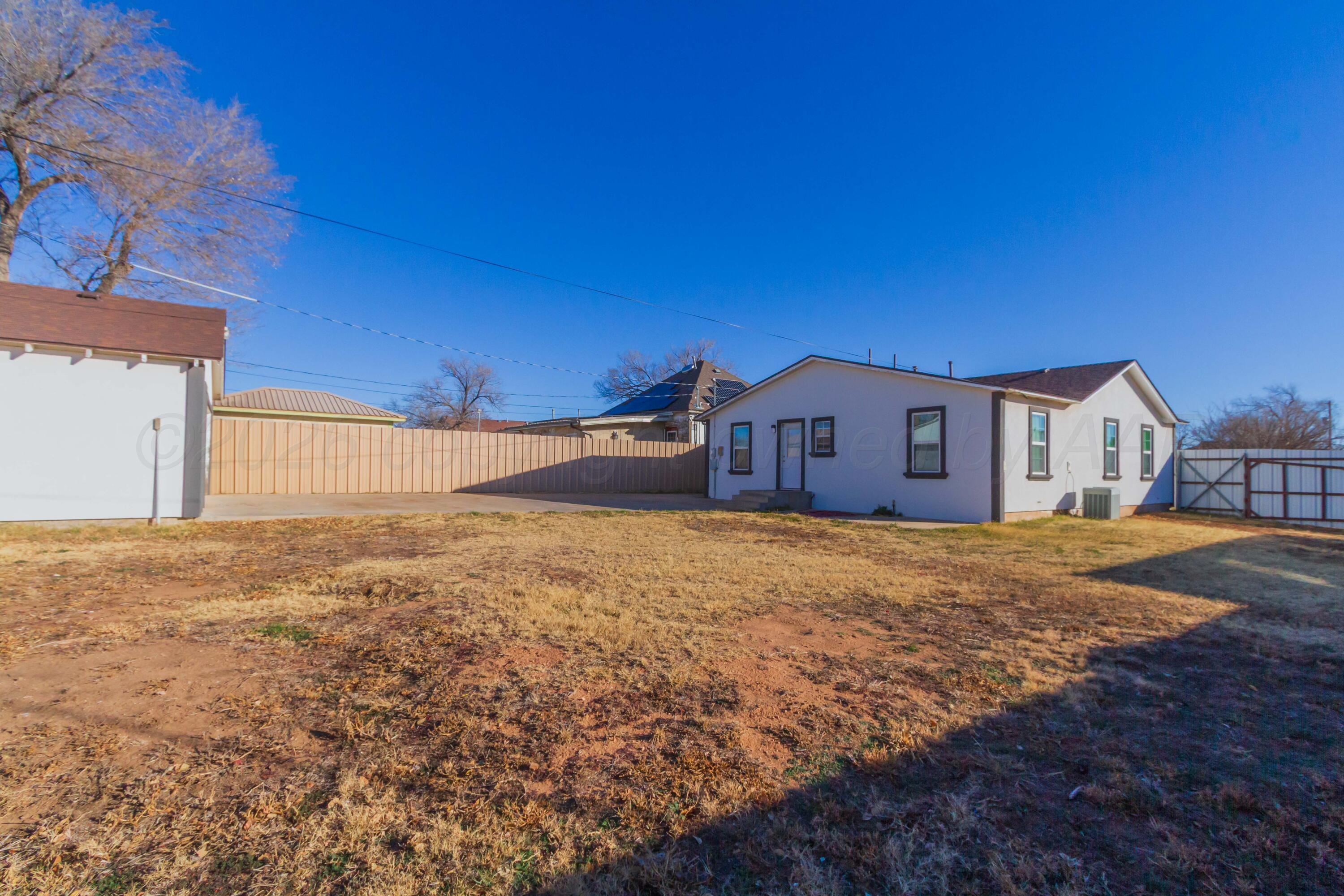 706 Pittsburg Street Amarillo, TX 79104 - Photo 22 of 22 a house view with a backyard space