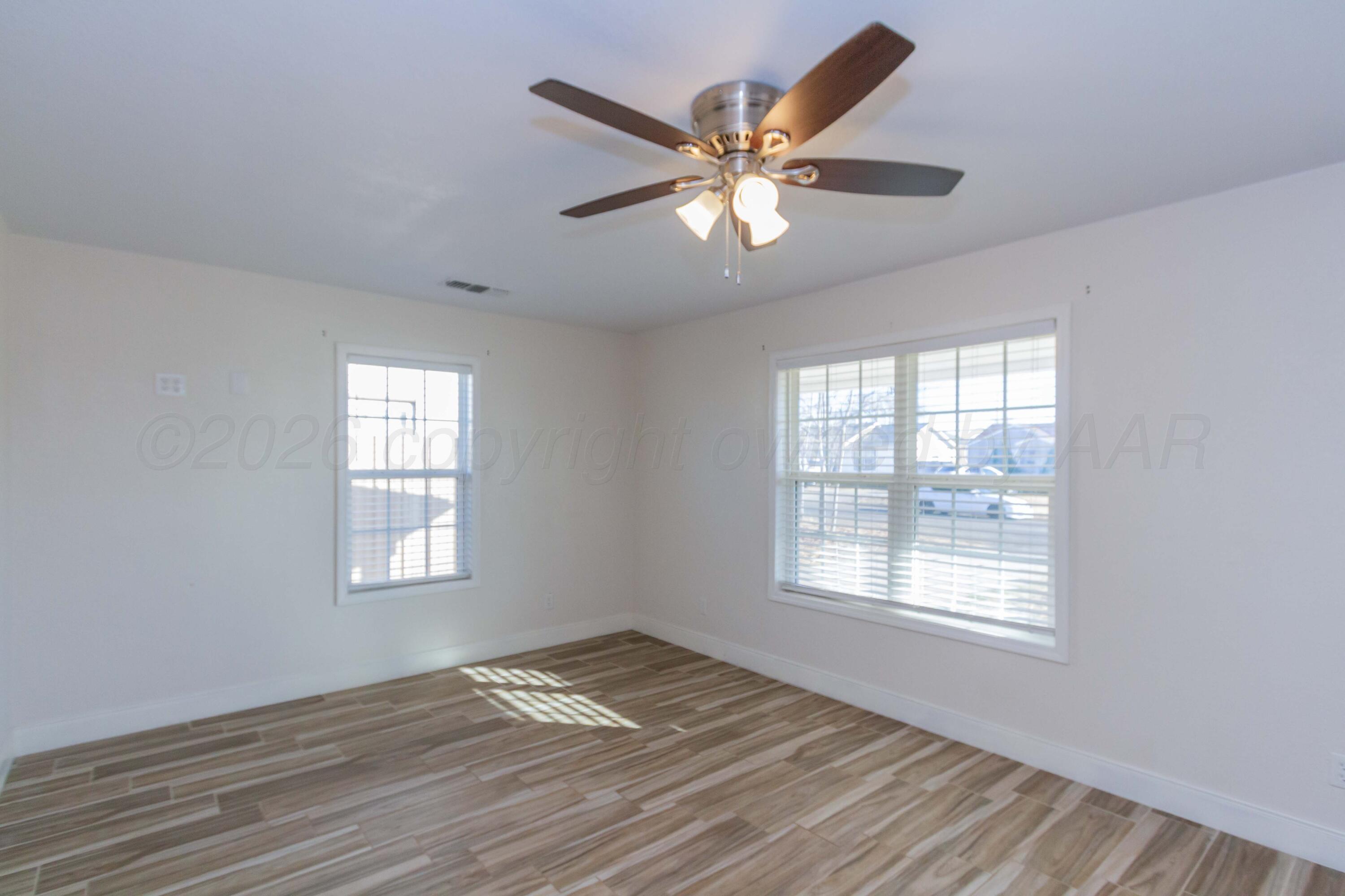 706 Pittsburg Street Amarillo, TX 79104 - Photo 4 of 22 a view of a livingroom with a window