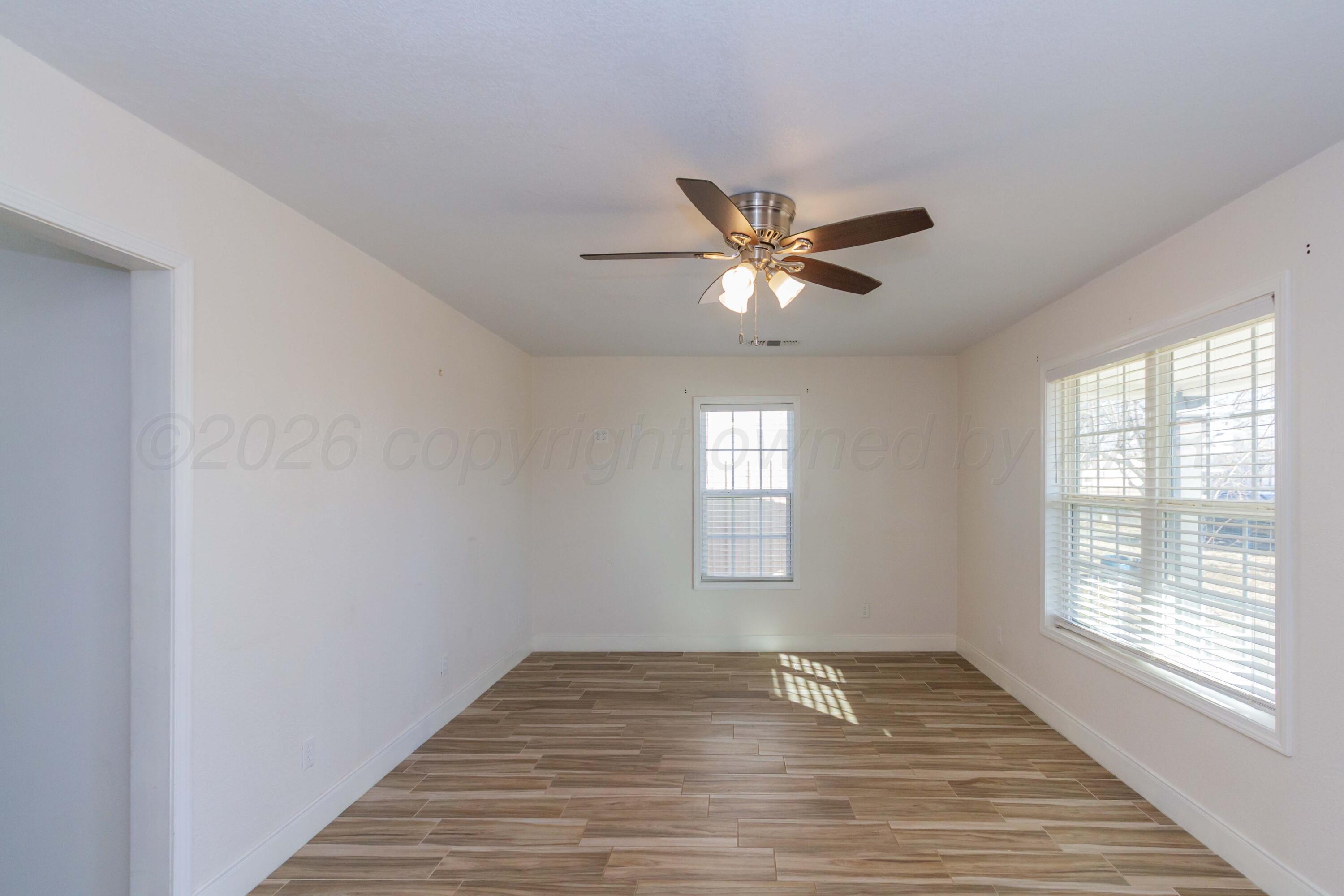 706 Pittsburg Street Amarillo, TX 79104 - Photo 5 of 22 a view of a livingroom with a window