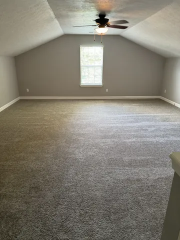 en empty room with windows