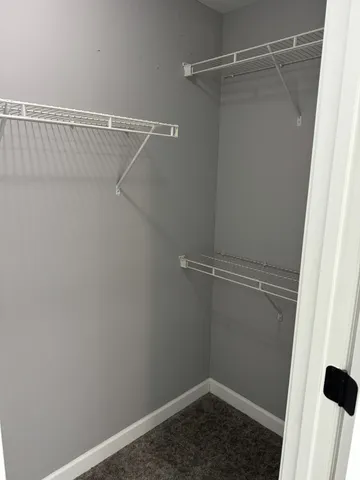 a view of a room with racks on the wall