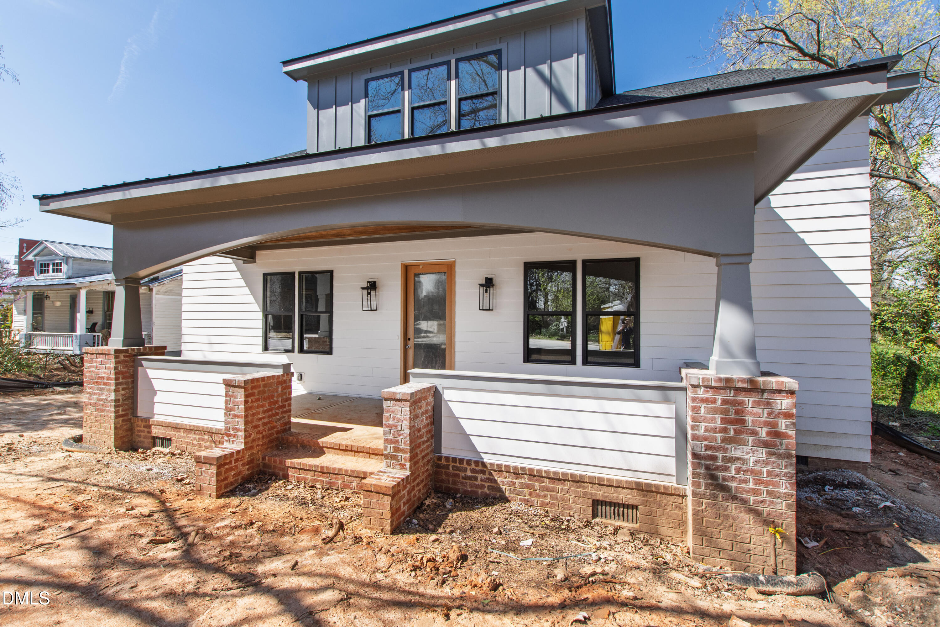 909 Oberlin Road Raleigh, NC 27605 - Photo 53 of 59 a front view of a house with a yard