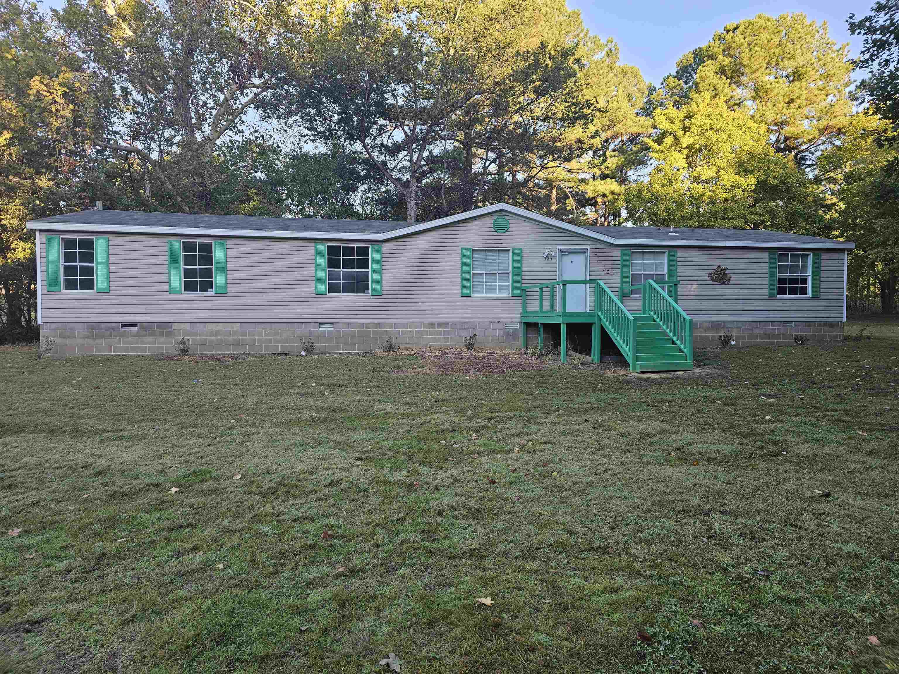 a house view with a backyard space
