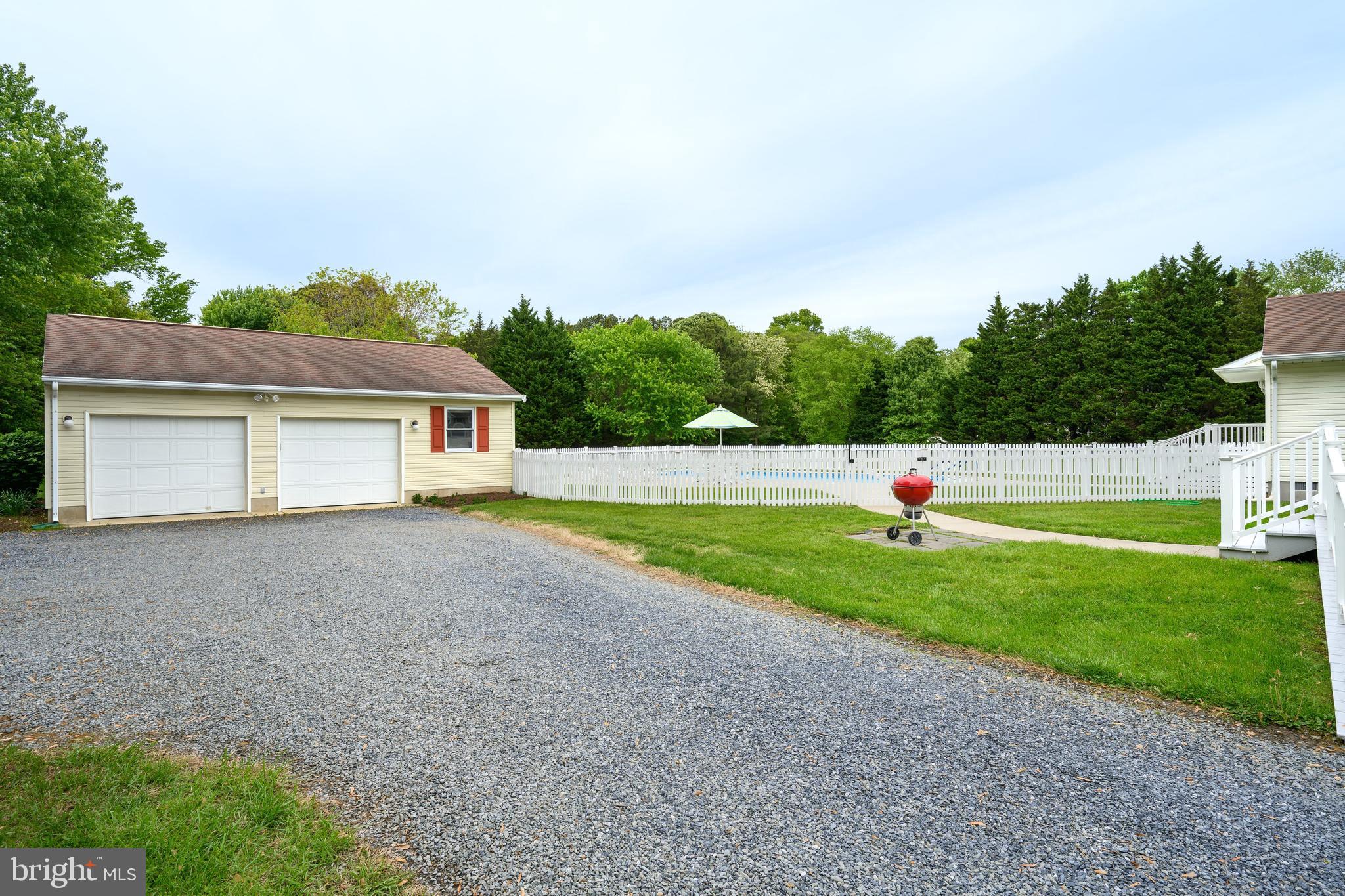 25714 Edgeview Road Royal Oak, MD 21662 - Photo 2 of 39 a view of a house with a backyard and a yard