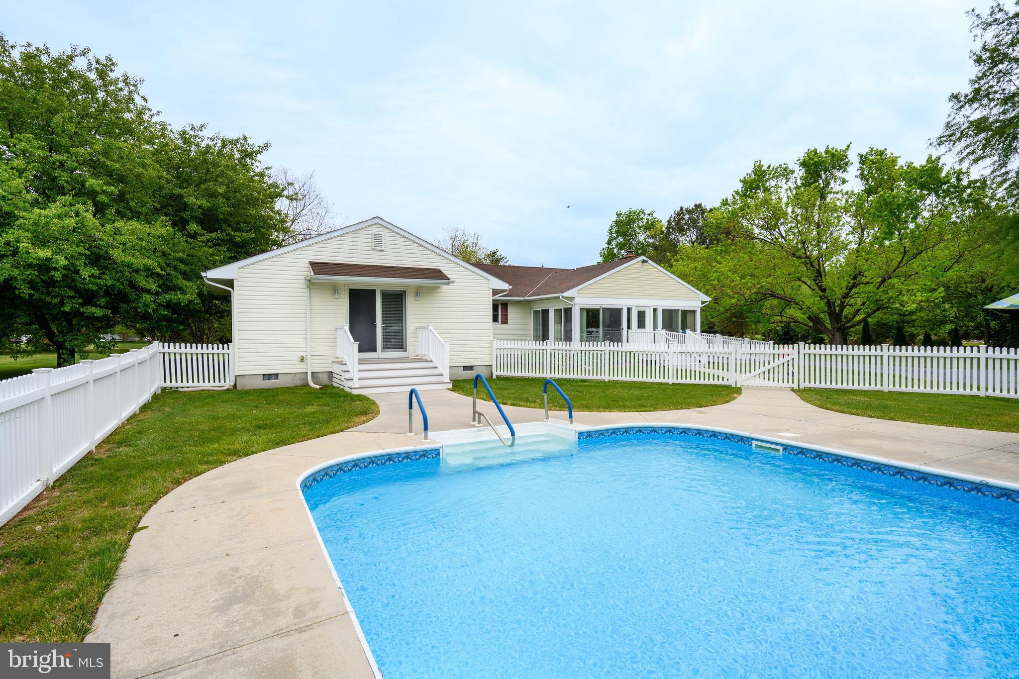 25714 Edgeview Road Royal Oak, MD 21662 - Photo 26 of 39 a view of house with swimming pool and yard