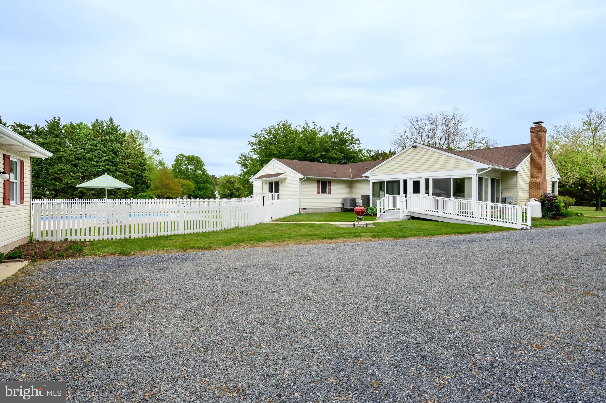 25714 Edgeview Road Royal Oak, MD 21662 - Photo 29 of 39 a view of house with outdoor space and swimming pool