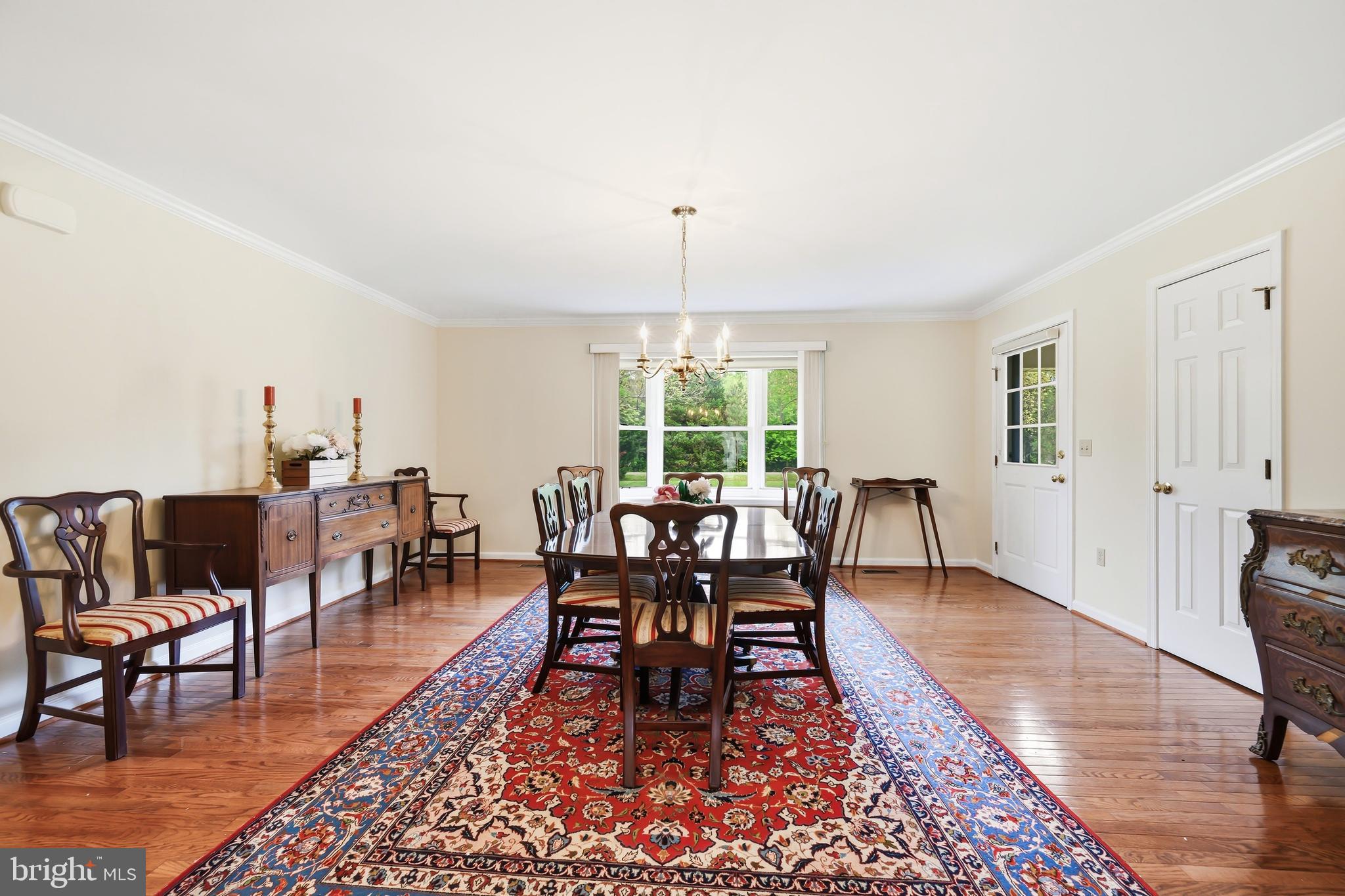 25714 Edgeview Road Royal Oak, MD 21662 - Photo 6 of 39 a dining room with furniture window and wooden floor