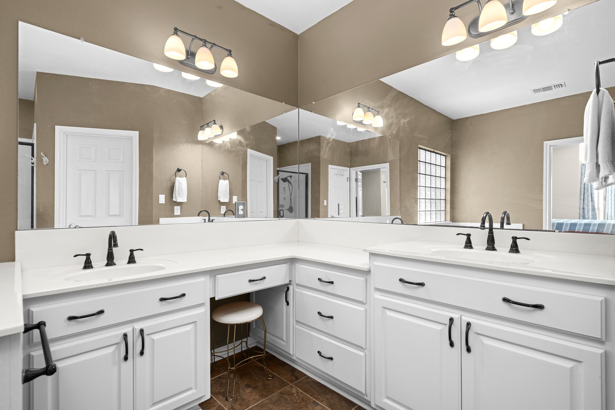 108 Thornwood Road Georgetown, TX 78628 - Photo 22 of 40 Ample counter space and dual vanities define this functional primary bathroom.