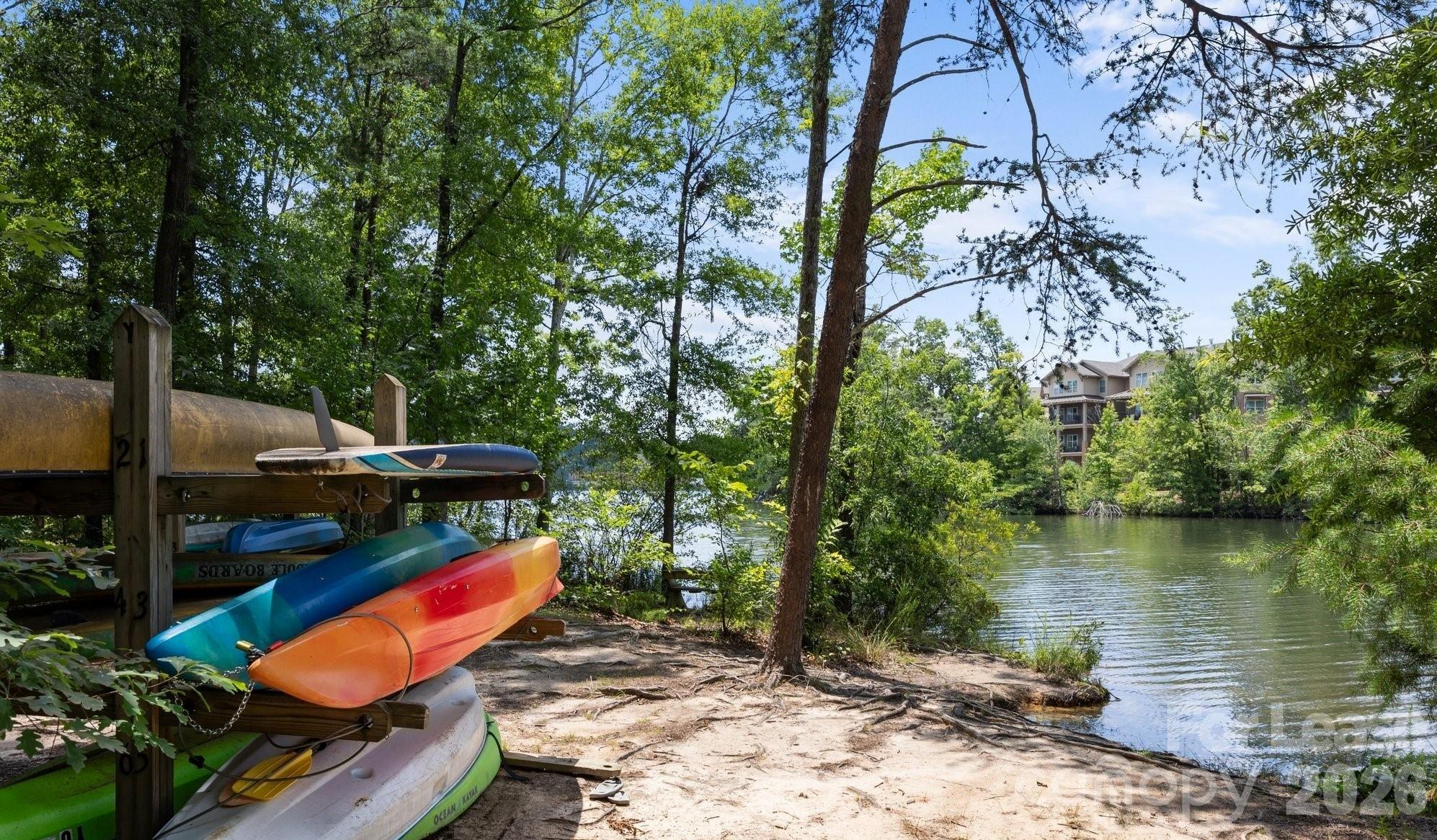 249 Faust Road Davidson, NC 28036 - Photo 19 of 21 a view of a lake with a sitting area