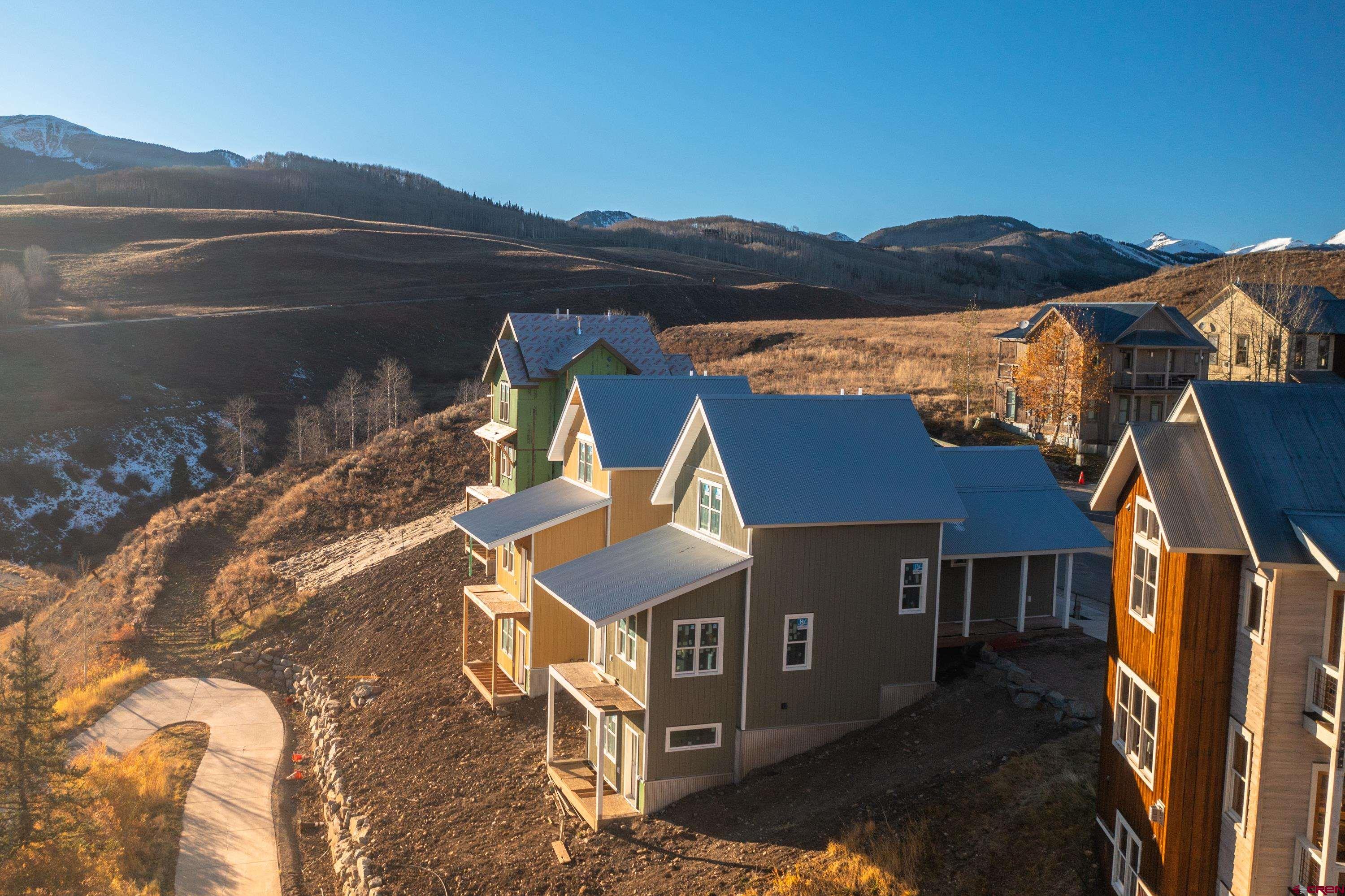 320 Horseshoe Crested Butte, CO 81225 - Photo 16 of 34 a view of house with a yard and mountain view