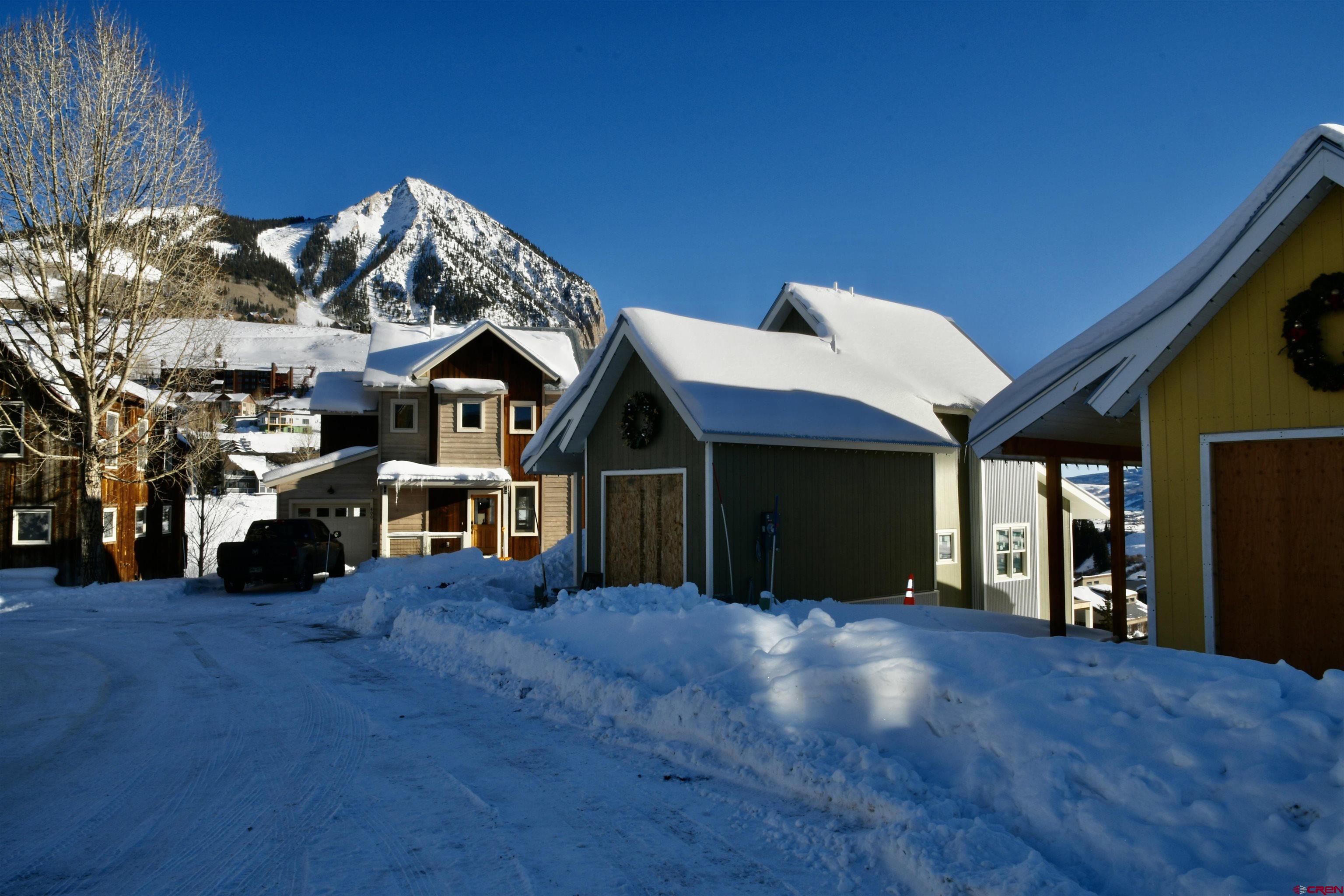 320 Horseshoe Crested Butte, CO 81225 - Photo 21 of 34 a view of a large building with a big yard and large trees