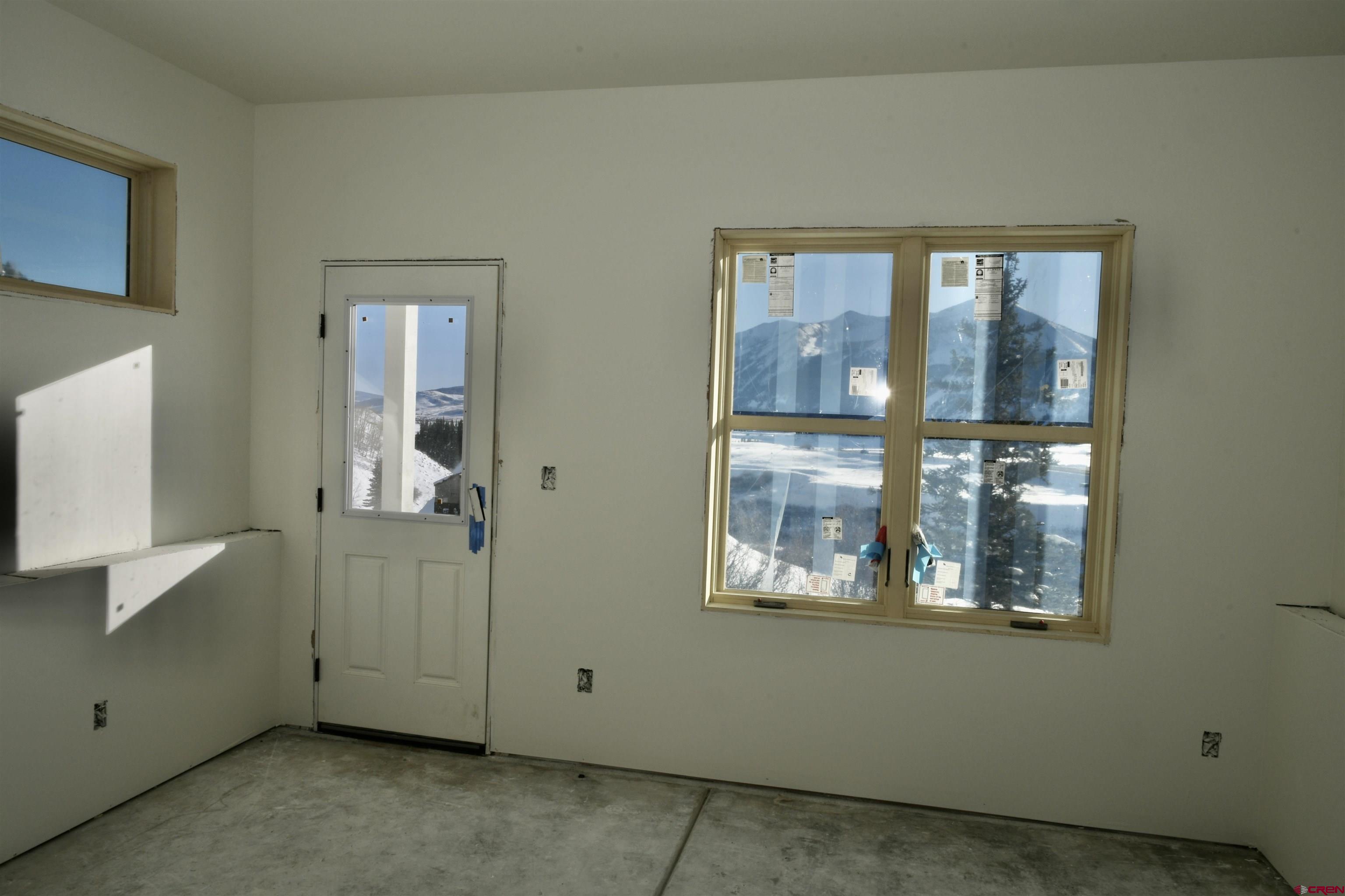 320 Horseshoe Crested Butte, CO 81225 - Photo 23 of 34 an empty room with windows