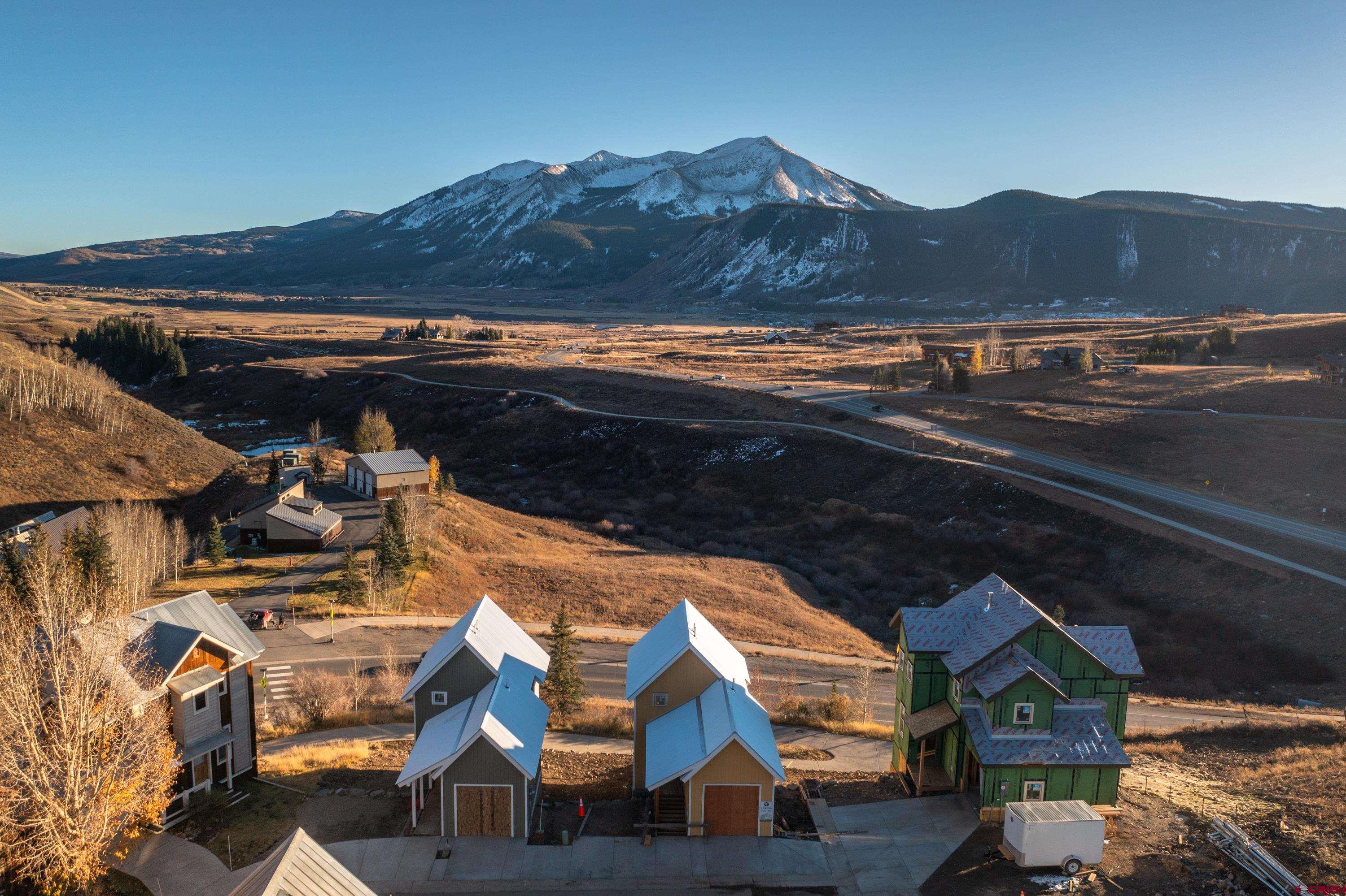 320 Horseshoe Crested Butte, CO 81225 - Photo 10 of 34 a view of multiple houses with a mountain