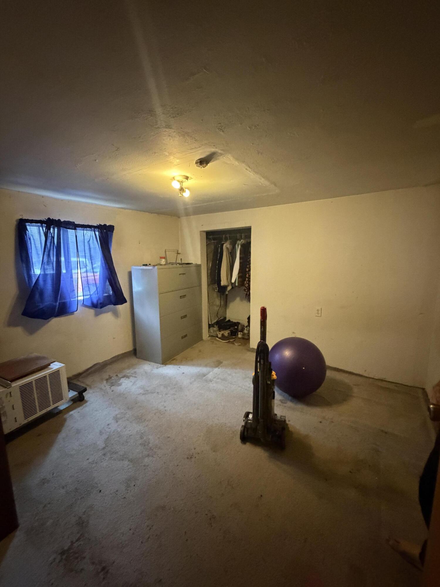 137003 Main Street Crescent, OR 97733 - Photo 6 of 19 a room with gym equipment and windows