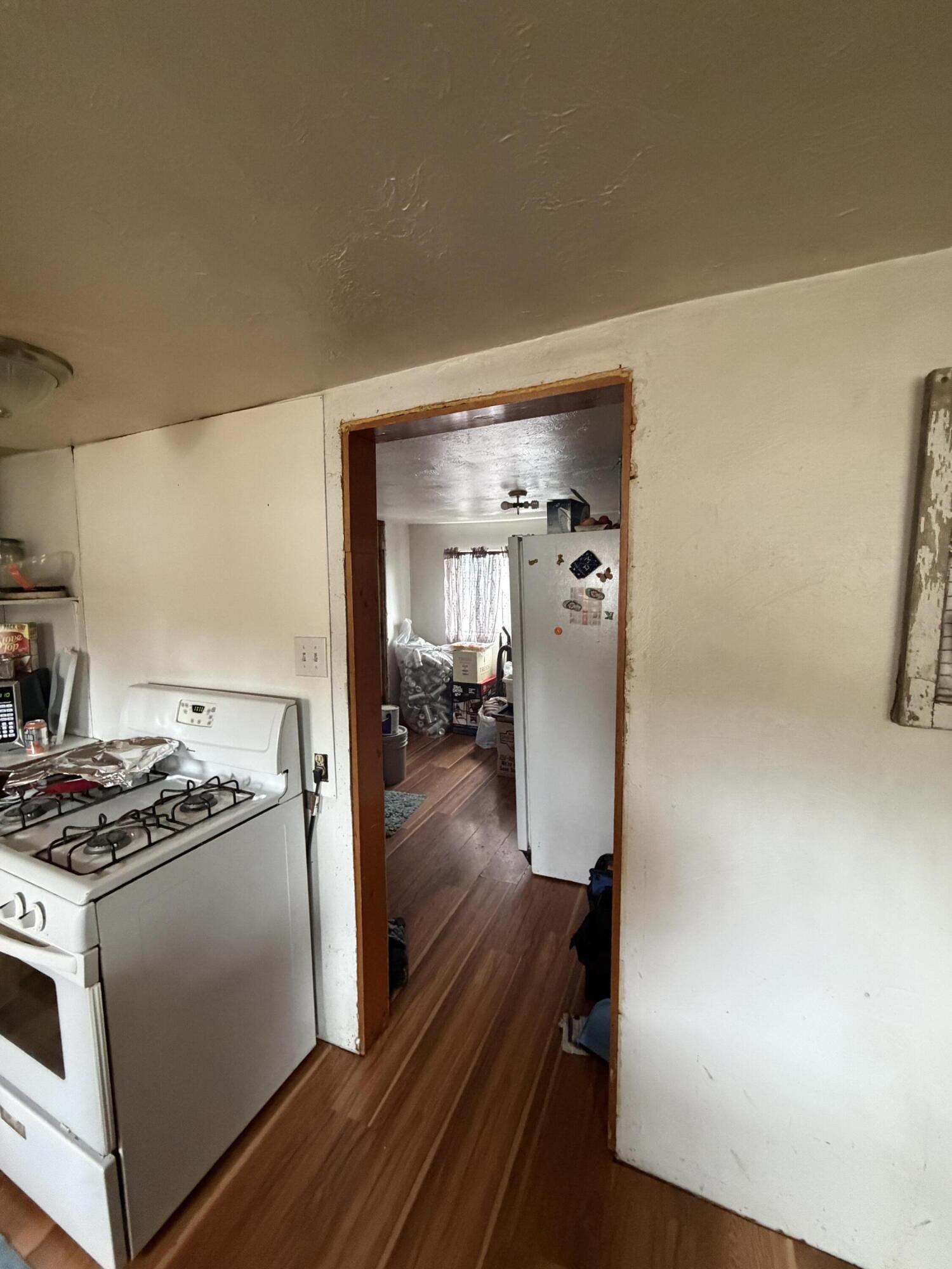 137003 Main Street Crescent, OR 97733 - Photo 10 of 19 a kitchen with a stove and wooden floor