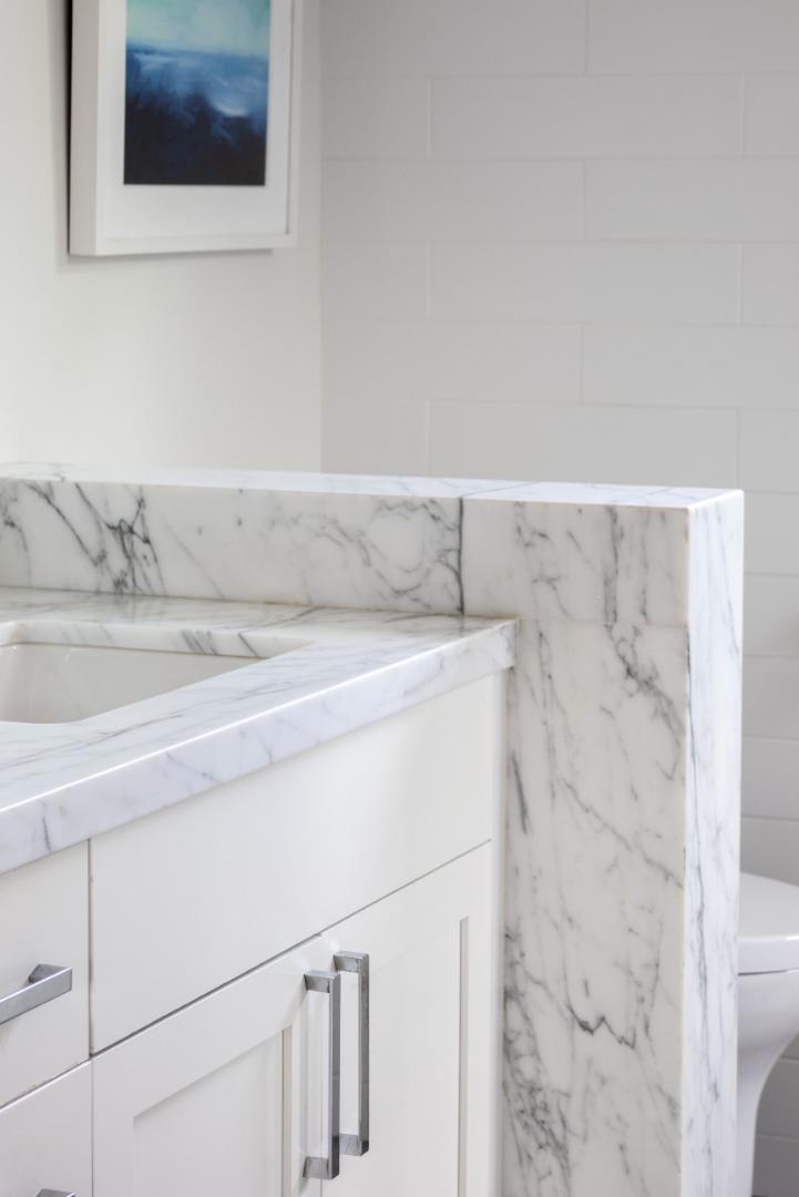 993 Embarcadero Road Palo Alto, CA 94303 - Photo 15 of 24 a bathroom with a sink and a mirror