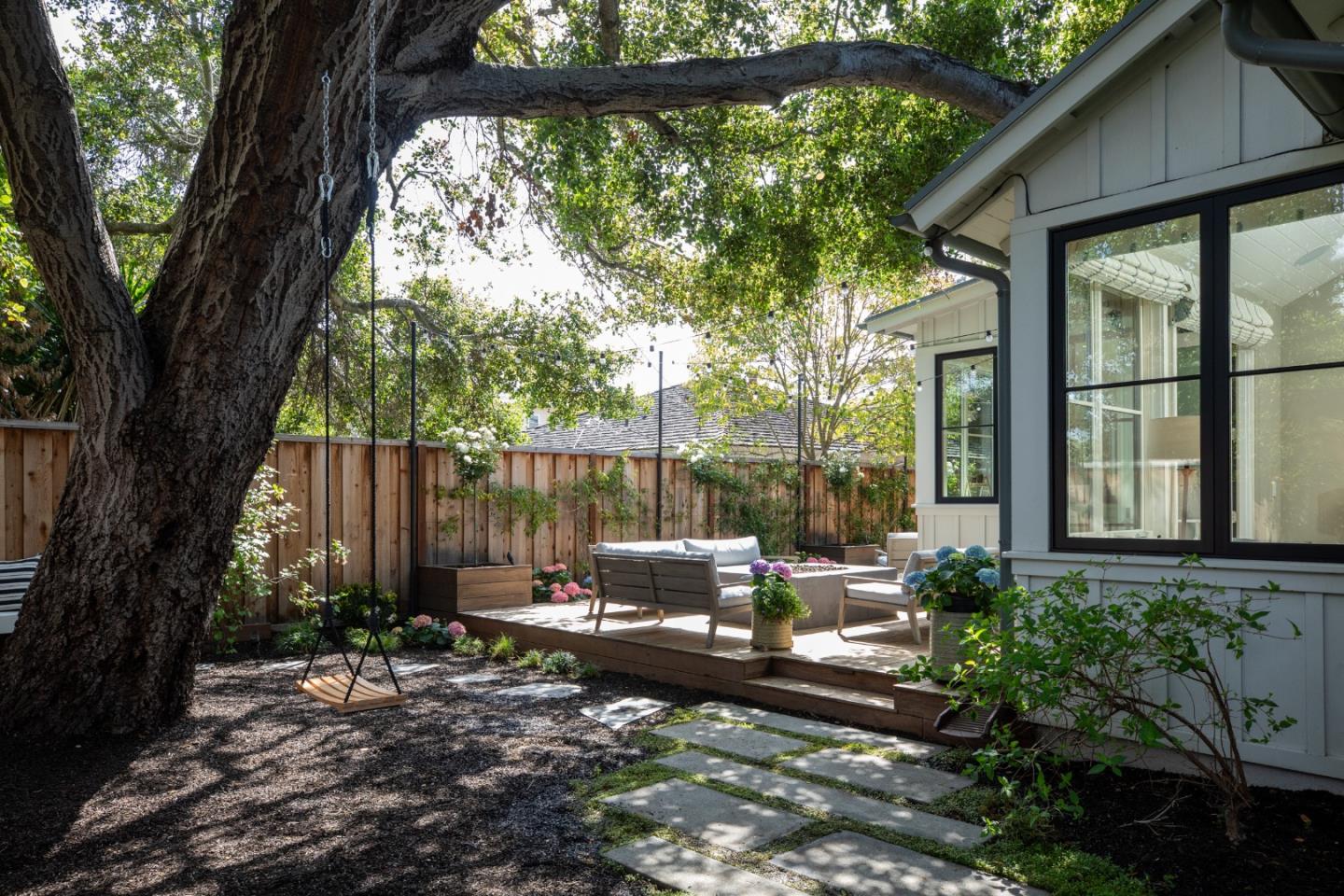 993 Embarcadero Road Palo Alto, CA 94303 - Photo 22 of 24 a view of a house with backyard and sitting area