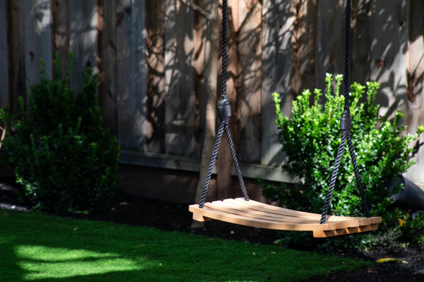 993 Embarcadero Road Palo Alto, CA 94303 - Photo 24 of 24 a wooden bench sitting in the middle of a yard