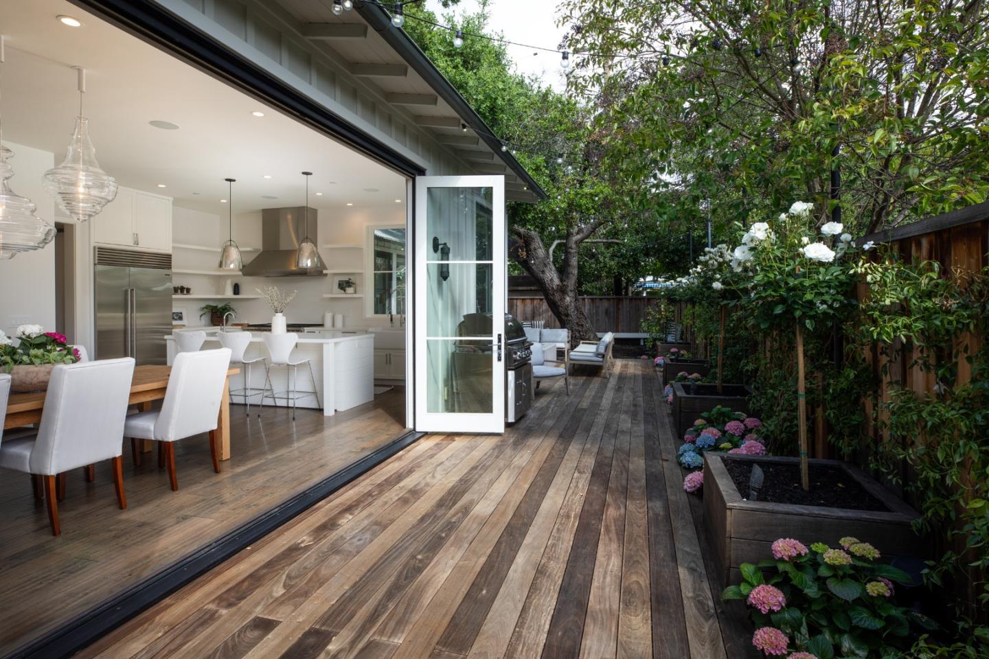 993 Embarcadero Road Palo Alto, CA 94303 - Photo 5 of 24 a view of a patio with chairs and potted plants