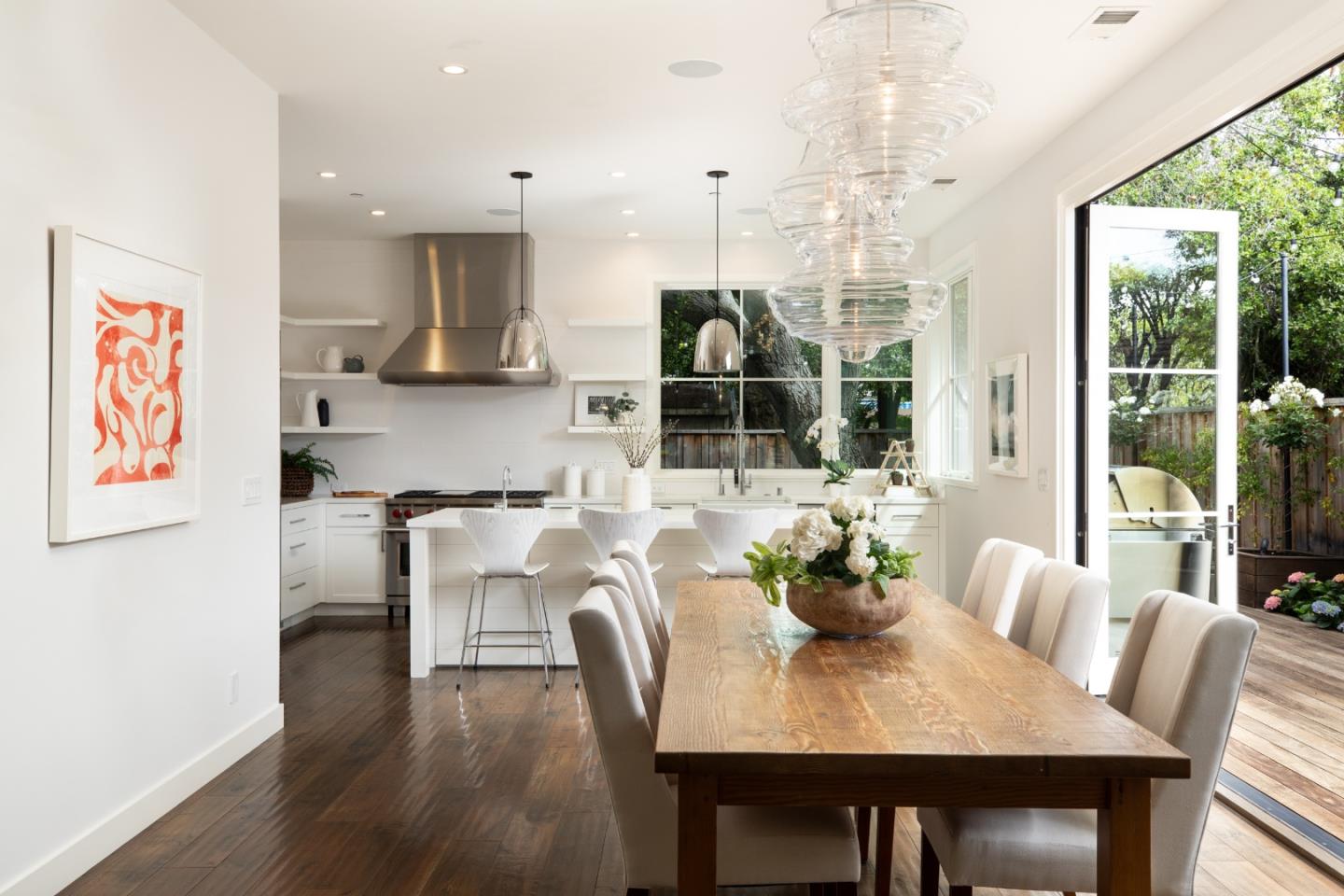993 Embarcadero Road Palo Alto, CA 94303 - Photo 7 of 24 a dining room with furniture and wooden floor