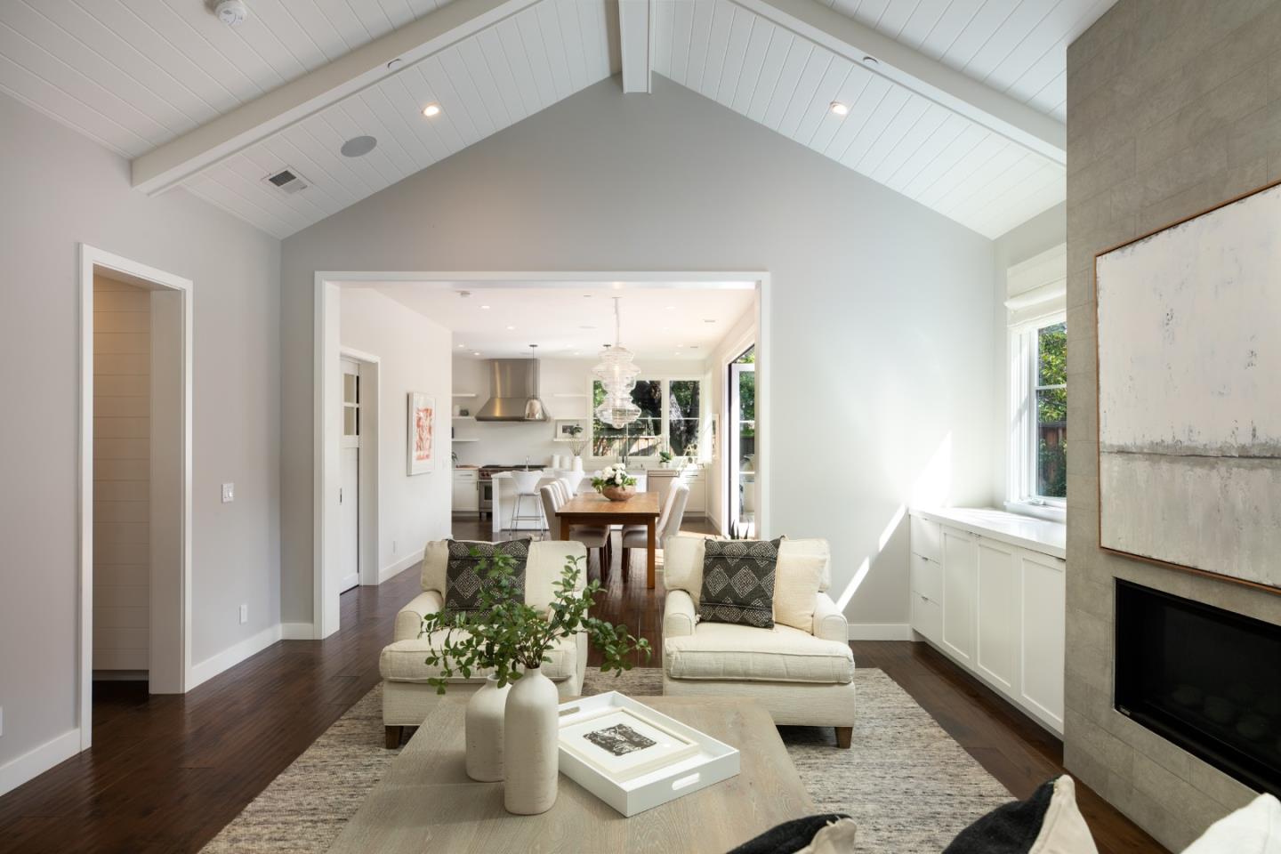 993 Embarcadero Road Palo Alto, CA 94303 - Photo 9 of 24 a living room with furniture and a fireplace