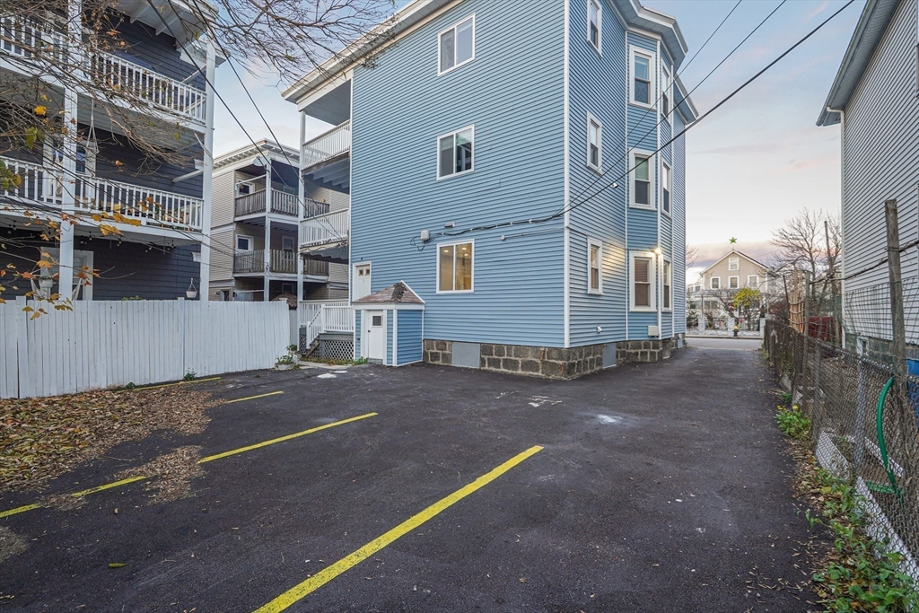 381 Adams Street, Unit 1 Boston, MA 02122 - Photo 29 of 42 a view of a street with buildings