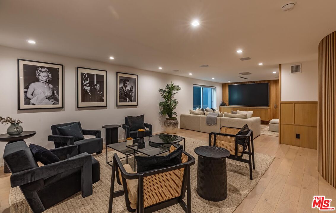 31220 Broad Beach Road Malibu, CA 90265 - Photo 26 of 33 a living room with furniture and a flat screen tv
