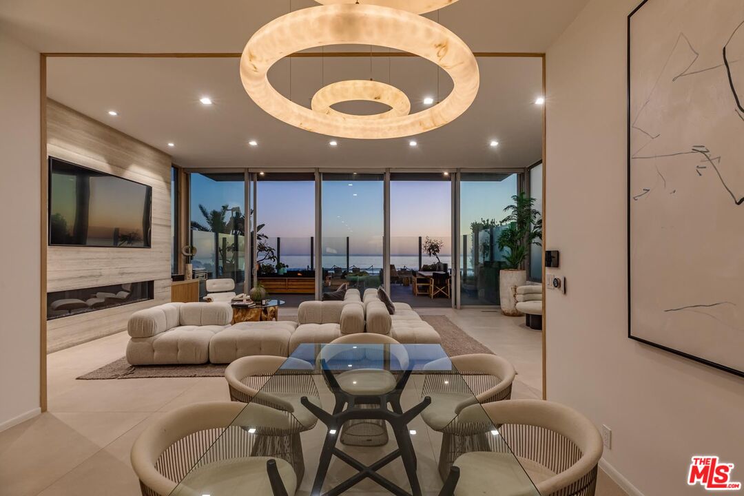 31220 Broad Beach Road Malibu, CA 90265 - Photo 31 of 33 a living room with furniture and a flat screen tv