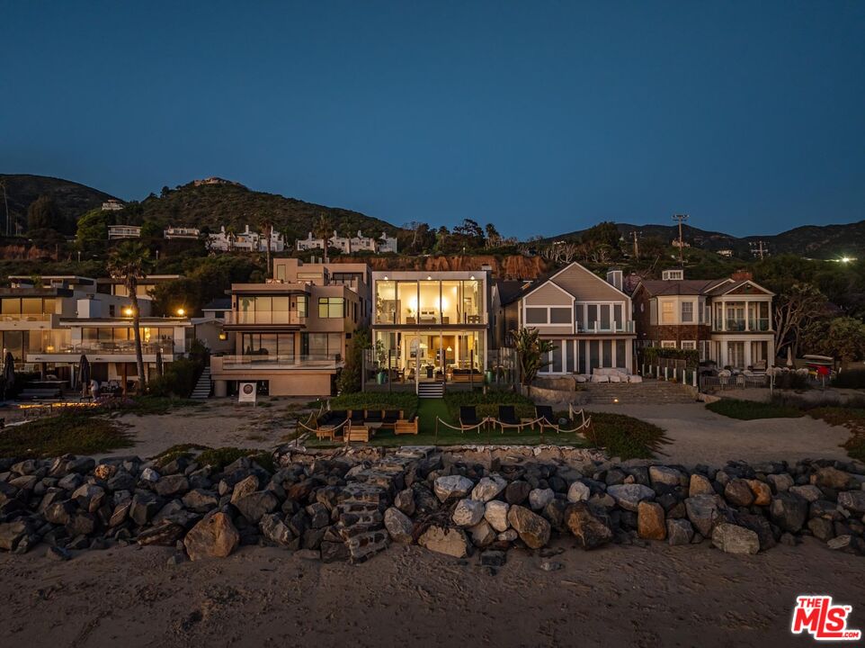 31220 Broad Beach Road Malibu, CA 90265 - Photo 33 of 33 a view of a big house with a street